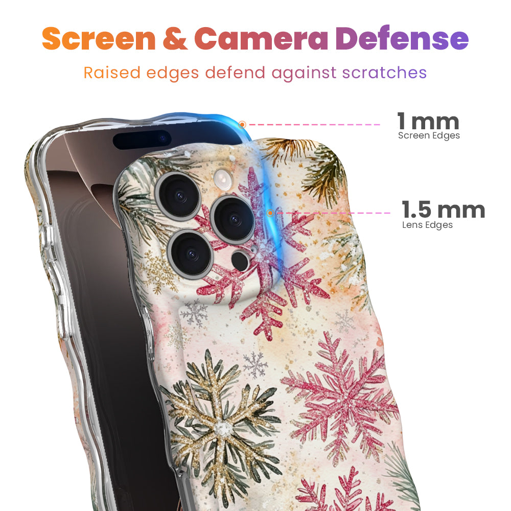 Champagne Snowfall iPhone case with 1 mm raised screen edges and 1.5 mm raised camera lens edges, pink and gold snowflake print