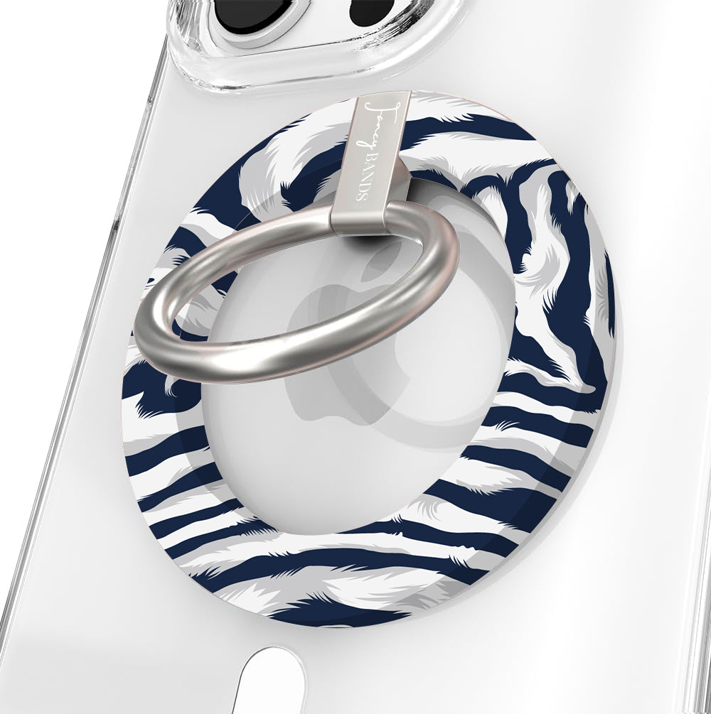 Zebra, Obviously Hold It Fancy MagSafe grip ring in navy and white zebra print with a brushed silver ring, attached magnetically to the back of a clear iPhone case.