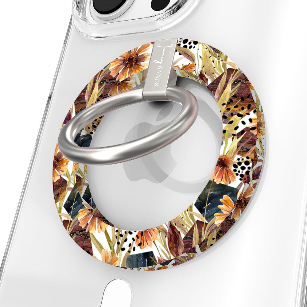 Sienna Petals Hold It Fancy MagSafe grip ring on a clear iPhone case, cream ring printed with watercolor rust and orange flowers and olive leaves.
