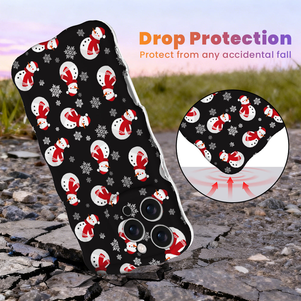 Snowman Wavy Luxe MagSafe iPhone case, black print with white snowmen in red scarves and Santa hats, with shock-absorbing corners for drop protection