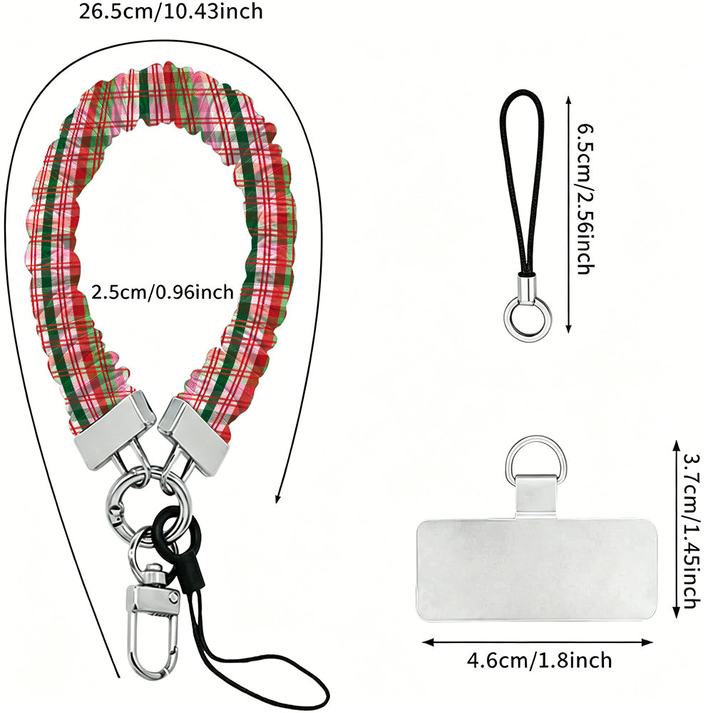 Merry Little Plaid scrunchie wrist strap dimensions: 26.5 cm strap, 2.5 cm wide, 6.5 cm loop, 4.6 x 3.7 cm phone tab
