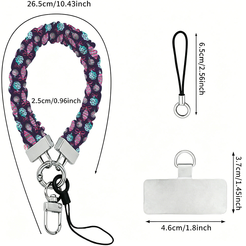 Just One More Ornament scrunchie wrist strap dimensions: 26.5 cm strap, 2.5 cm wide, 6.5 cm loop, 4.6 x 3.7 cm phone tab