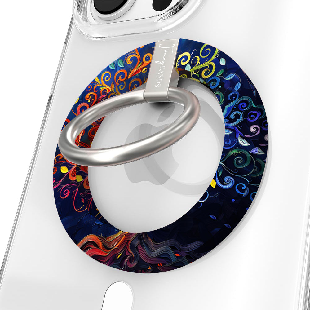 The Wishing Tree mystical fantasy MagSafe phone grip ring with vibrant orange and blue swirling filigree branches on a dark background compatible with iPhone and Samsung