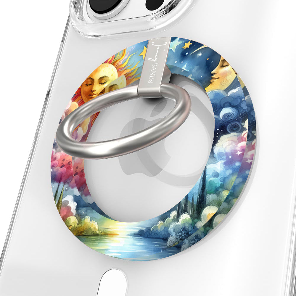Cosmic Daydream celestial MagSafe phone grip ring with watercolor illustration of a personified sun, crescent moon, and stars in a dreamlike landscape compatible with iPhone and Samsung