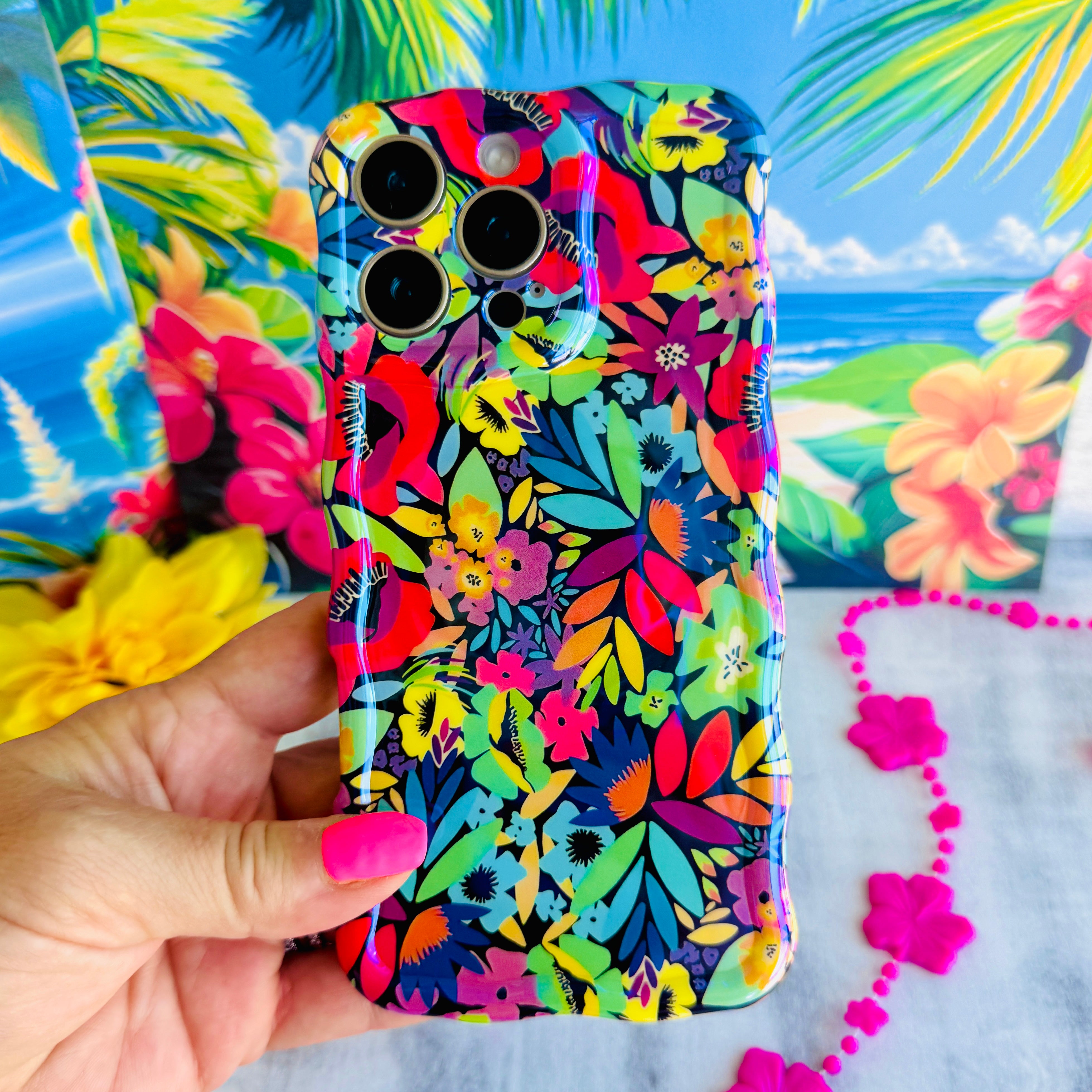 Electric Paradise MagSafe iPhone case with bright neon florals on black background by Fancy Bands