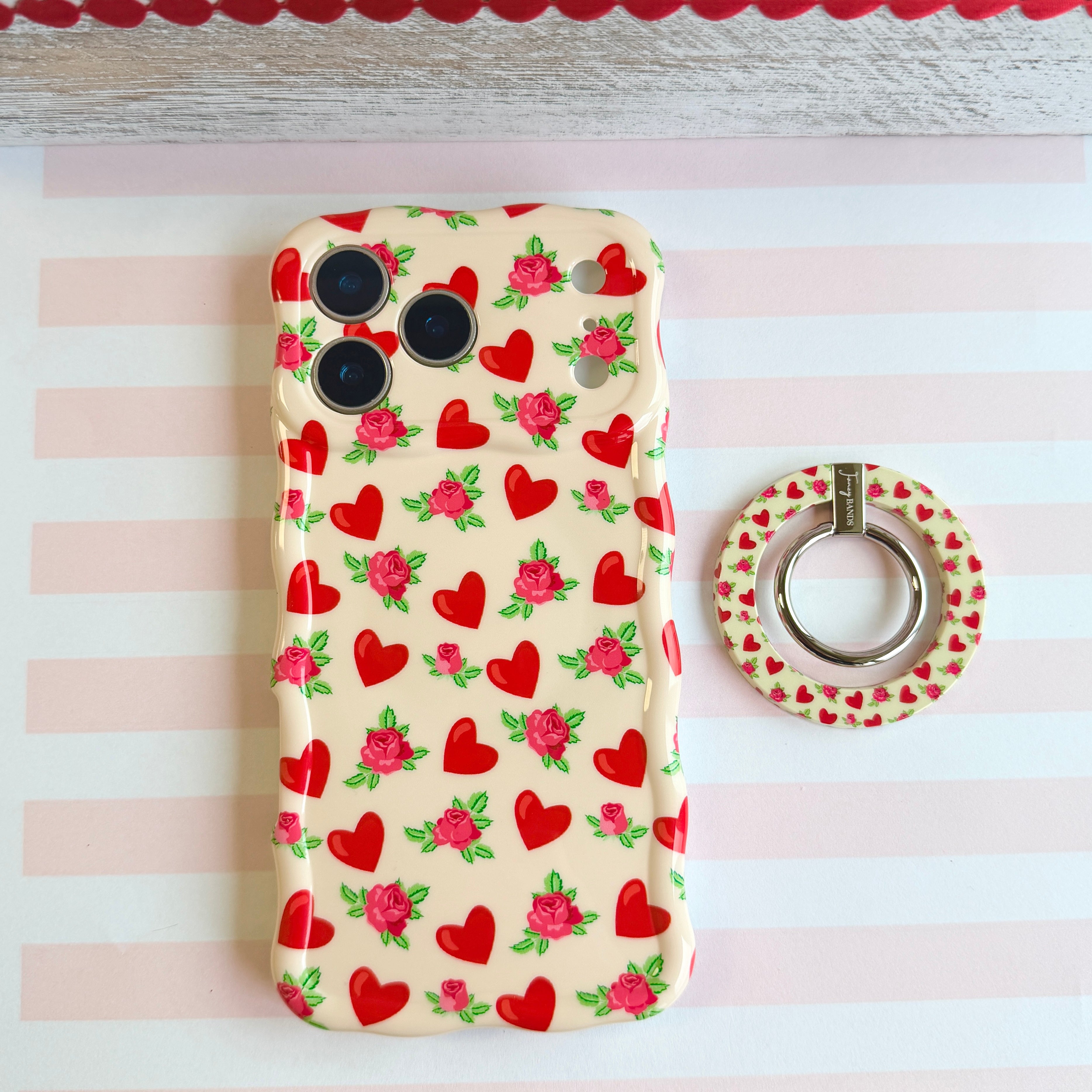 Sweetheart Blooms pattern MagSafe phone grip ring with red hearts and pink roses on cream background compatible with iPhone and Samsung