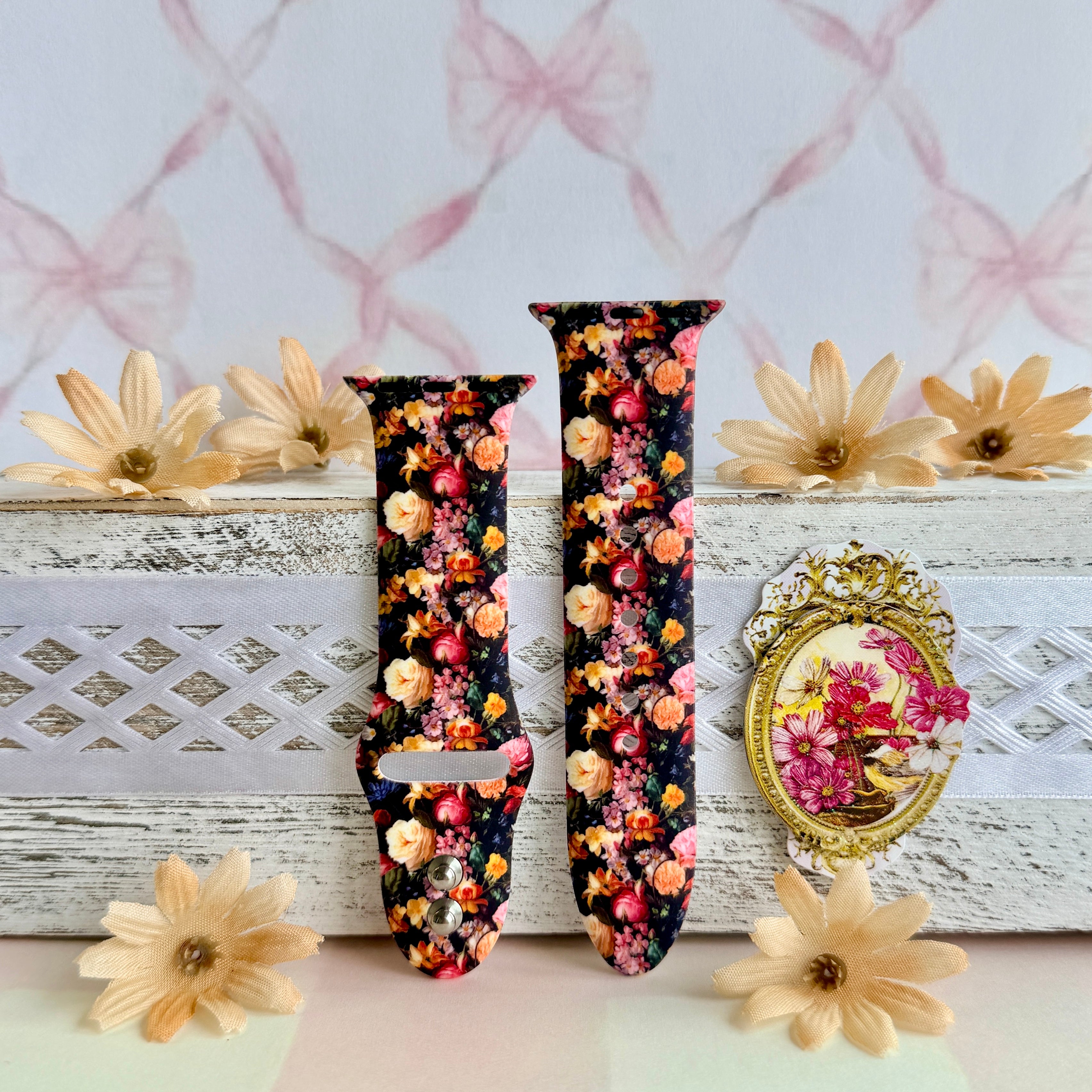 Twilight Bouquet Apple Watch band with vibrant pink, coral, and yellow flowers on black background with white daisies