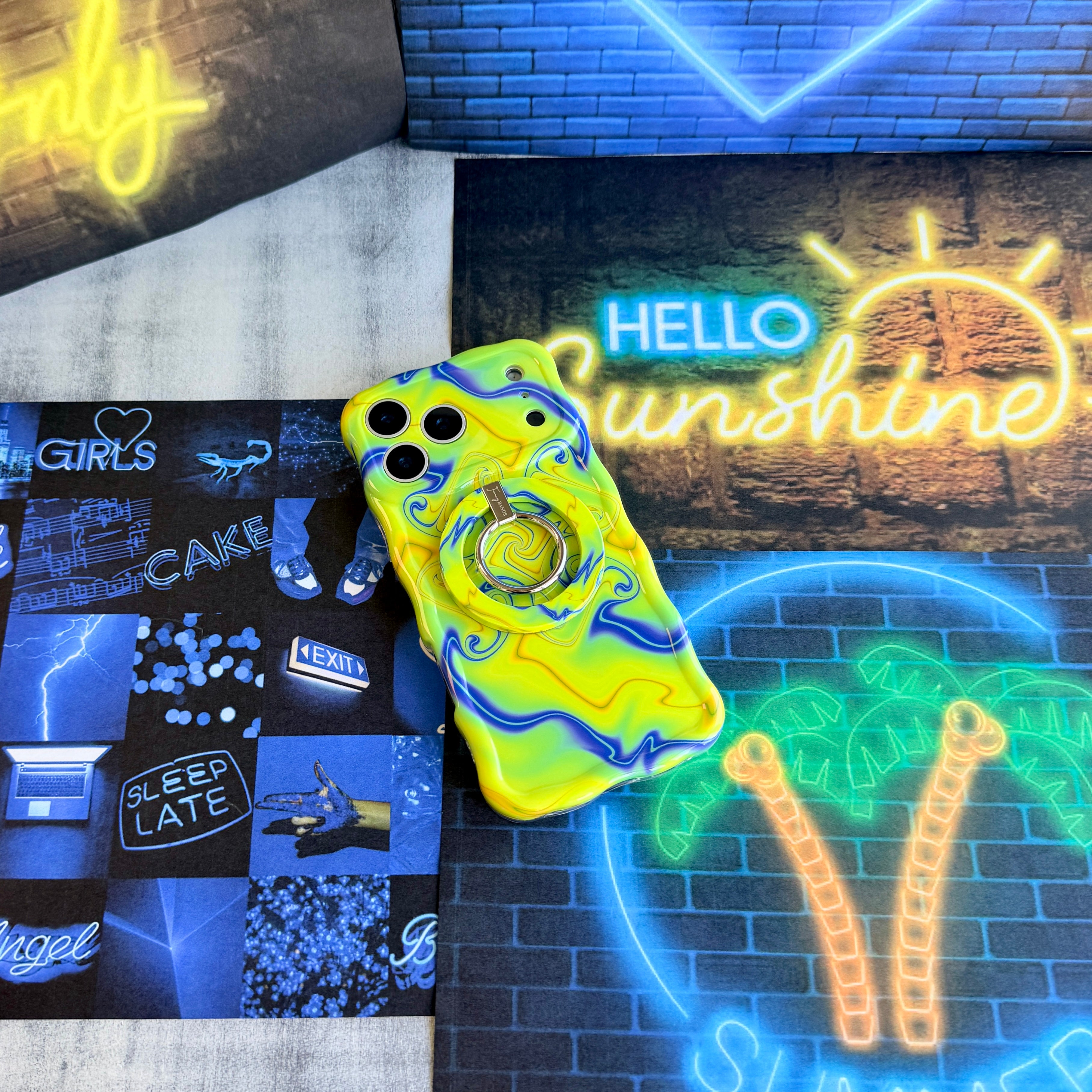 Trendy wavy iPhone case featuring an electric neon yellow and blue liquid swirl psychedelic pattern with a high-gloss finish.
