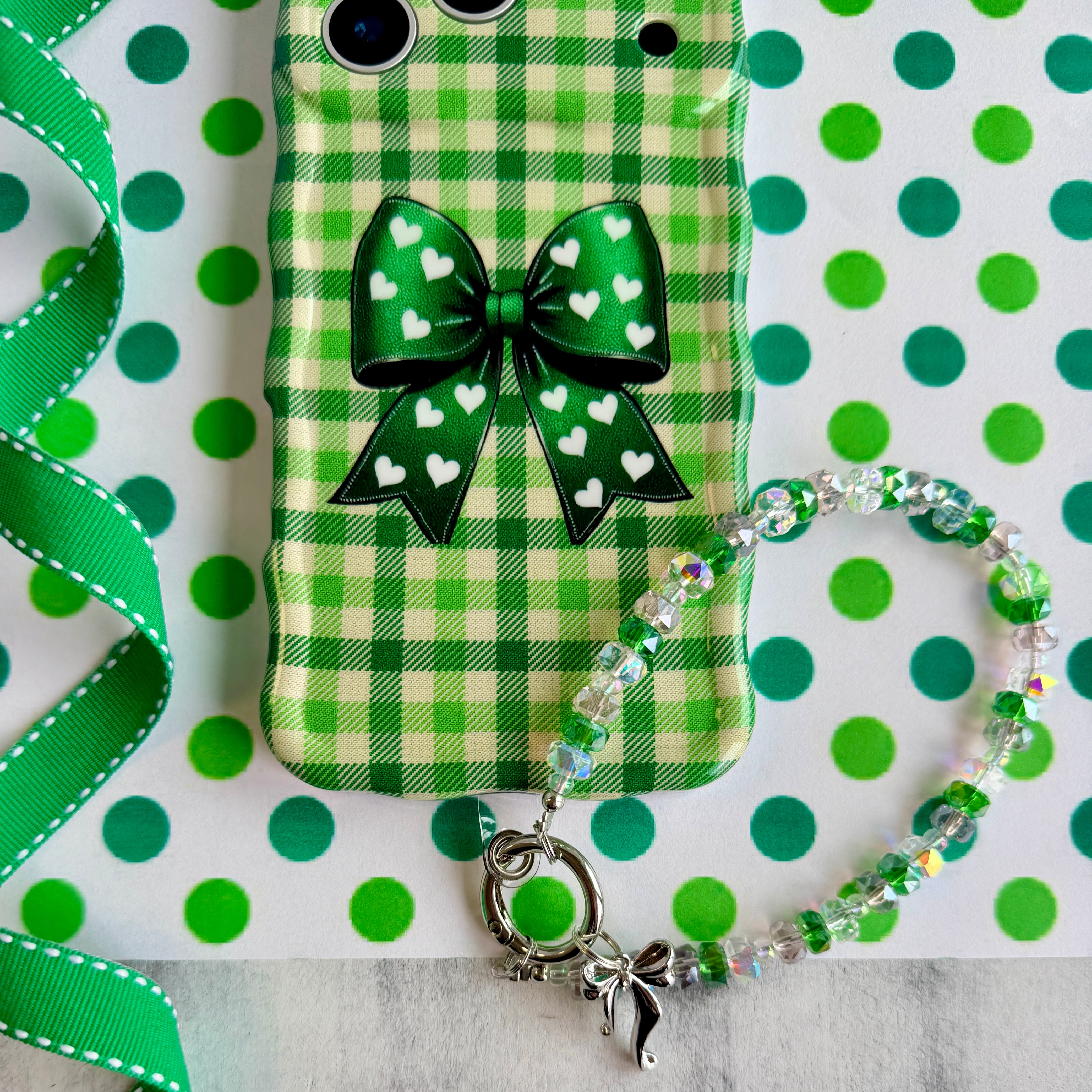 Bow & Bling Fancy Phone Charm â Bow & Bling Phone Charm - Iridescent & Emerald Beaded Phone Wrist Strap Put a bow on it and make it sparkle!