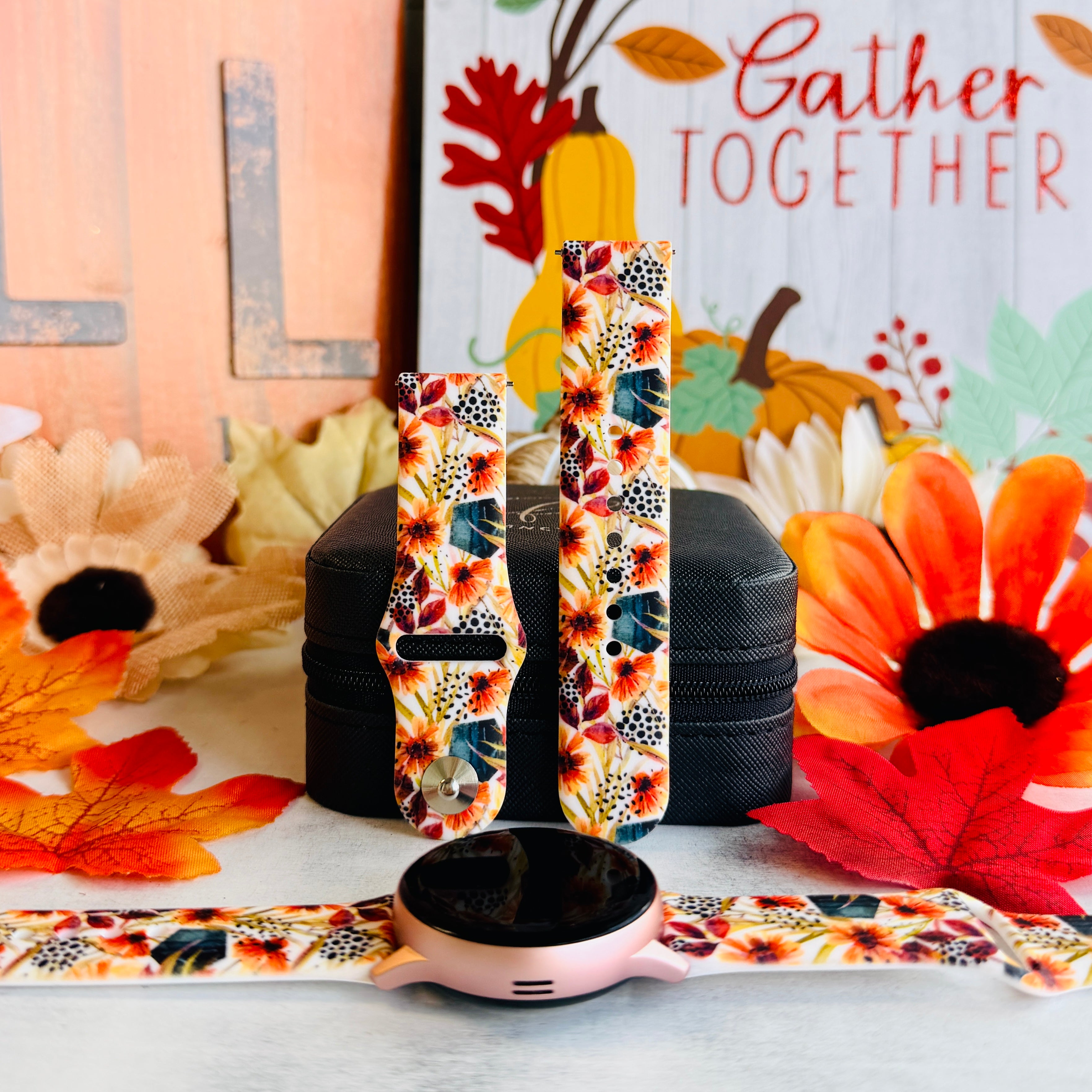 Sienna Petals silicone Samsung Galaxy Watch band shown in both sizes with a round rose gold Samsung watch at the base, cream rust floral print.