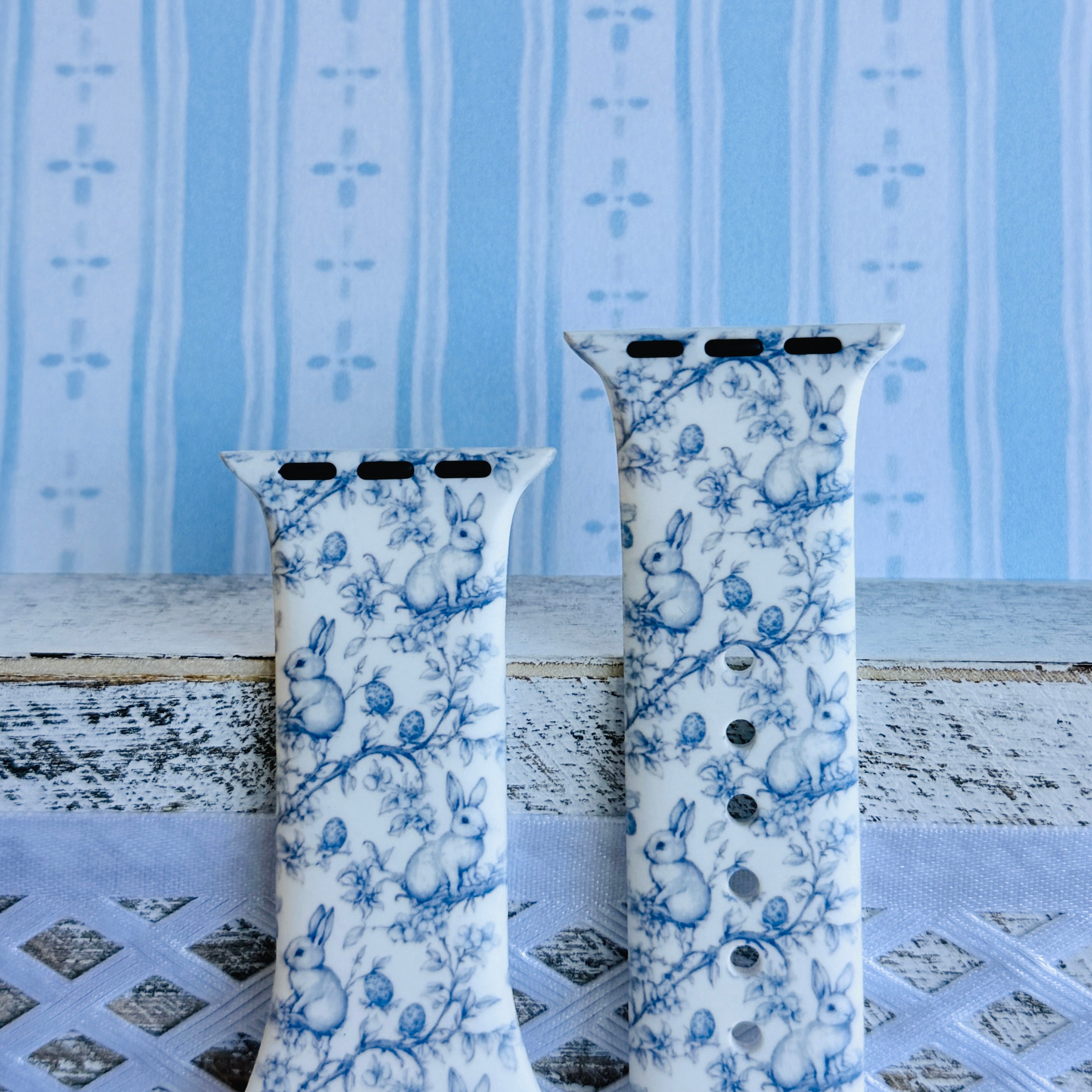 Bluebell Bunny Apple Watch band with blue floral pattern and bunny silhouettes on white background with blue balloons
