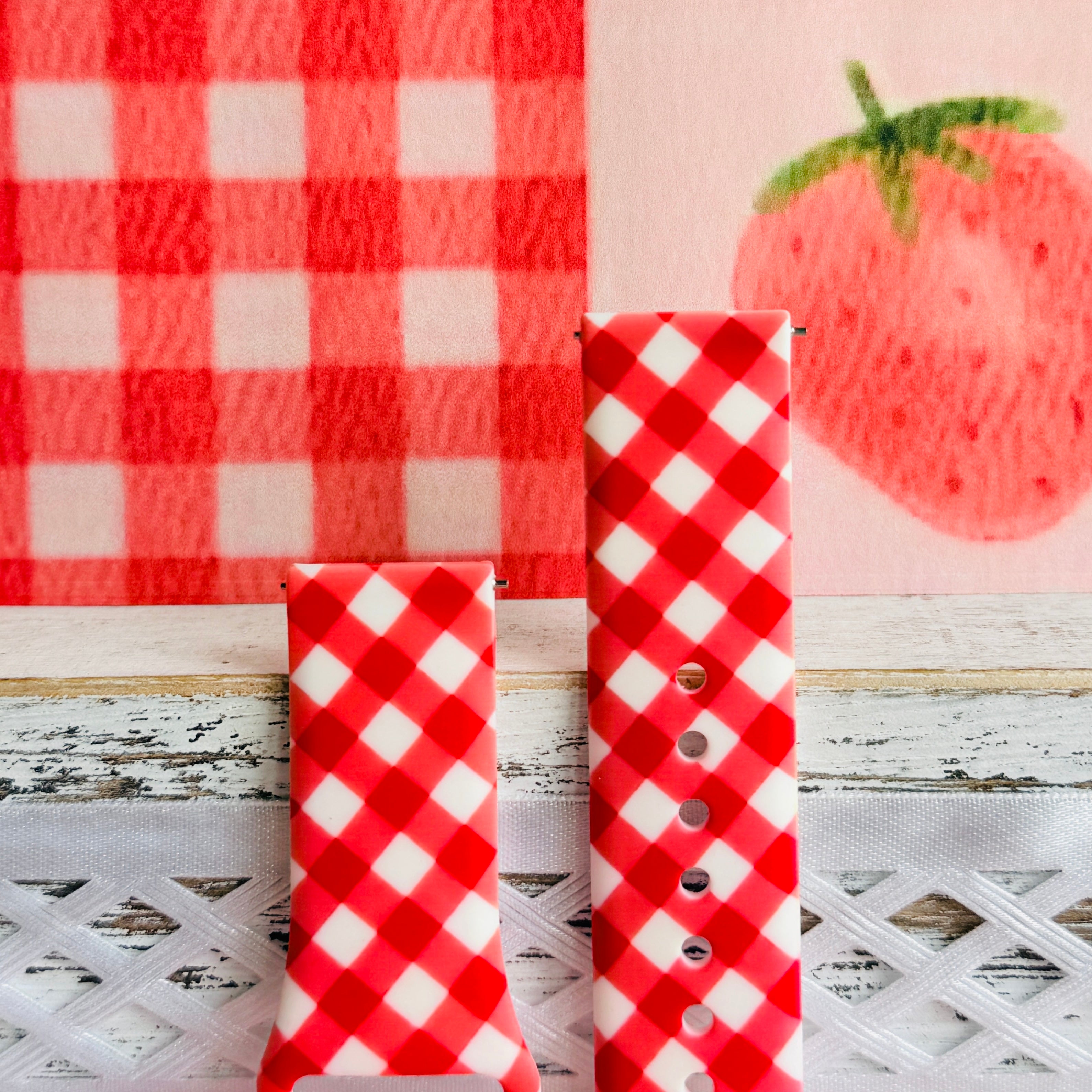 Both sizes of the Red Barn Babe Samsung Galaxy Watch band side by side, close view of the diagonal red and white gingham check.