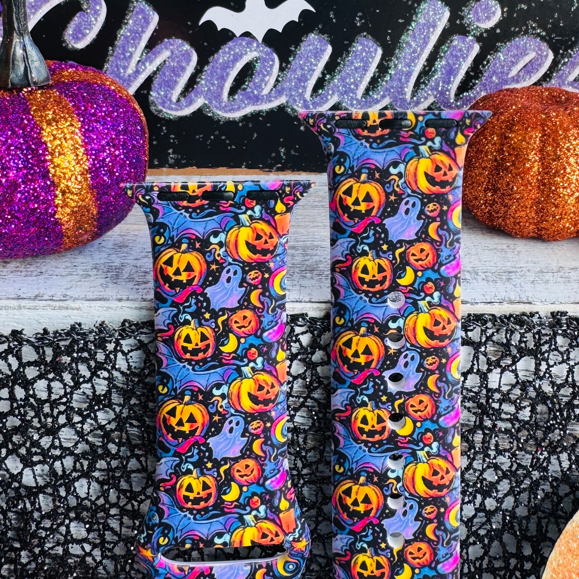 silicone apple watch strap closeup – jack-o-lantern jive print, purple and blue swirls