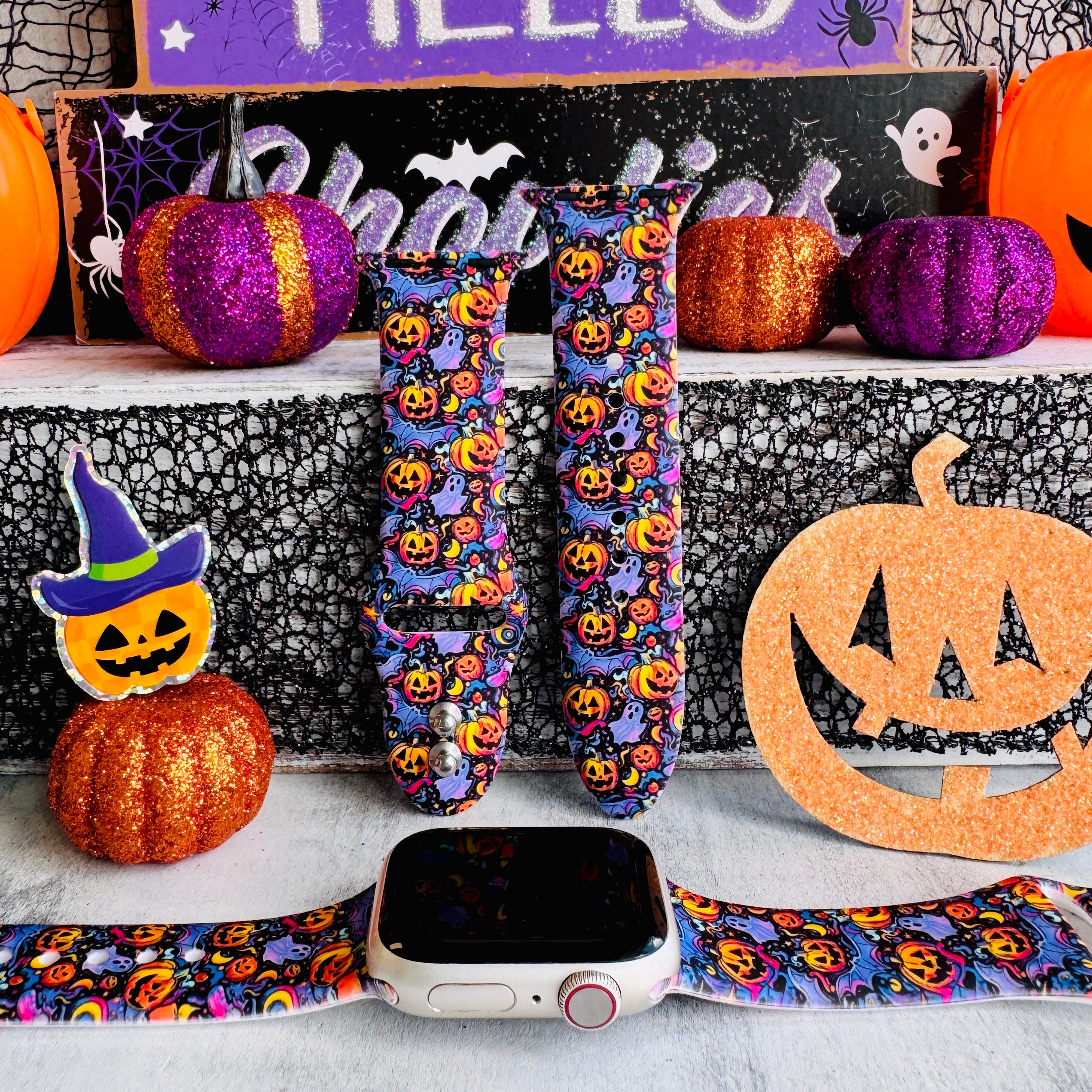 jack-o-lantern jive apple watch band – black silicone with neon pumpkins, ghosts and swirls; fits 38–49 mm