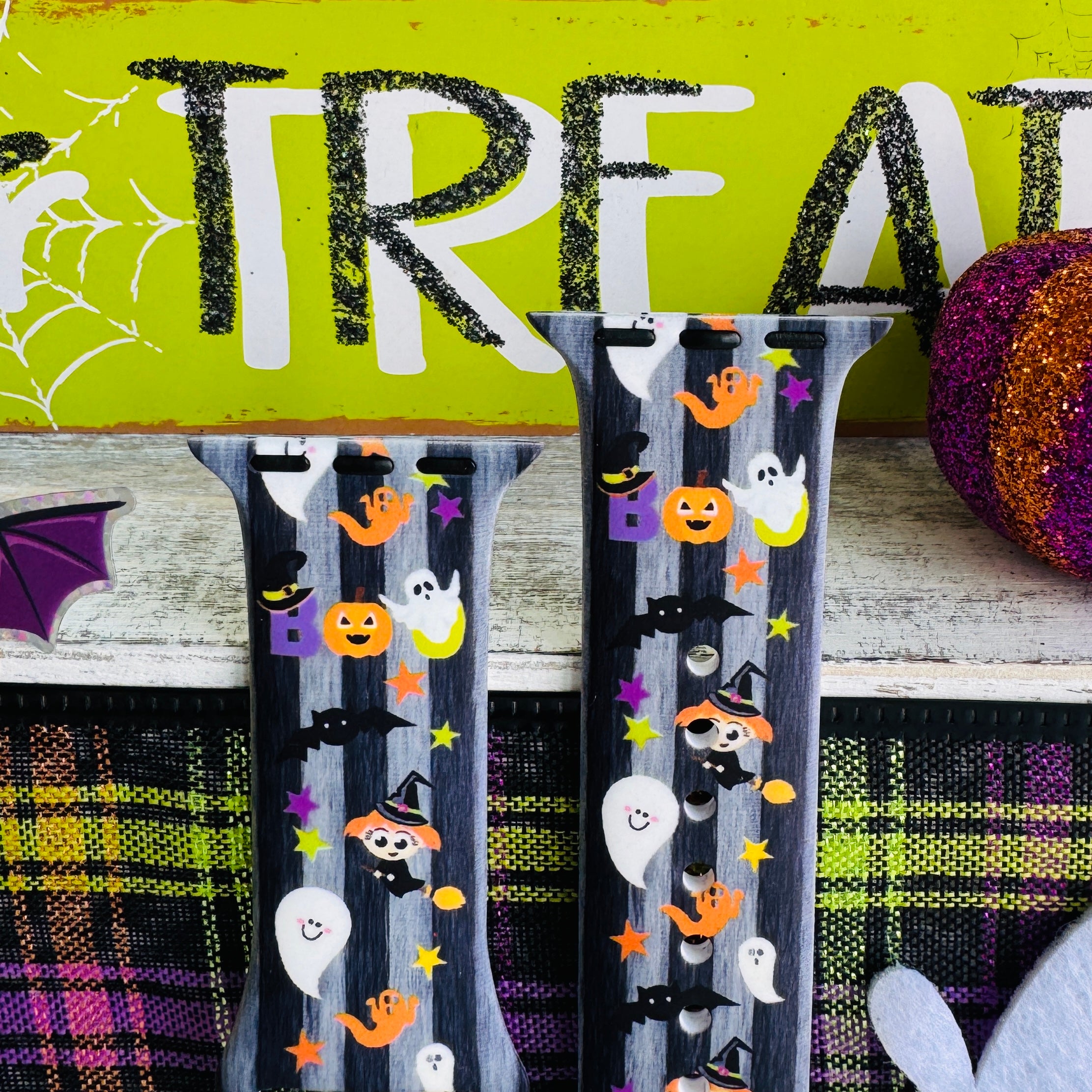 silicone apple watch strap closeup – boo crew vertical parade print, neon accents