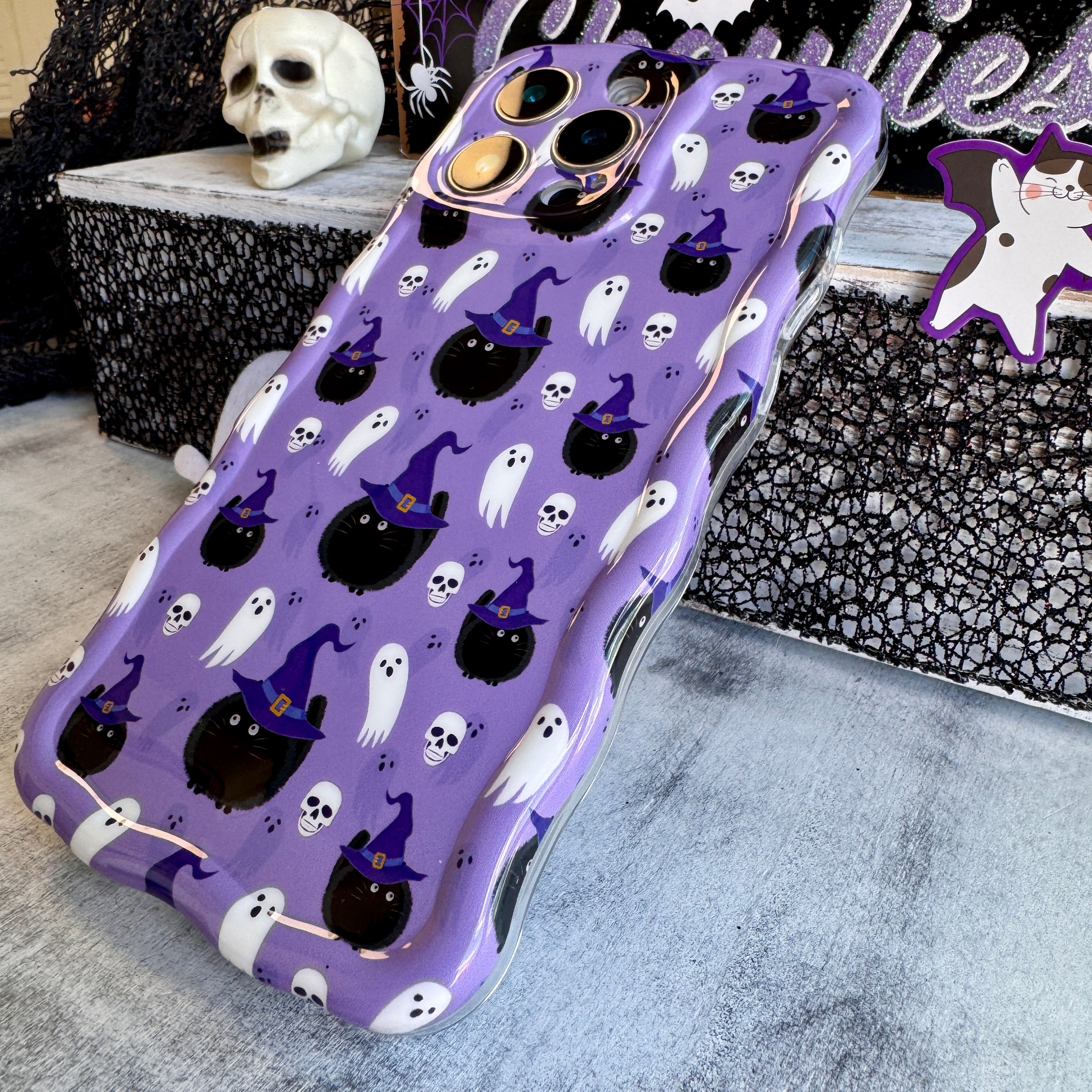 Back view showing MagSafe compatibility on Ghostly Whiskers case