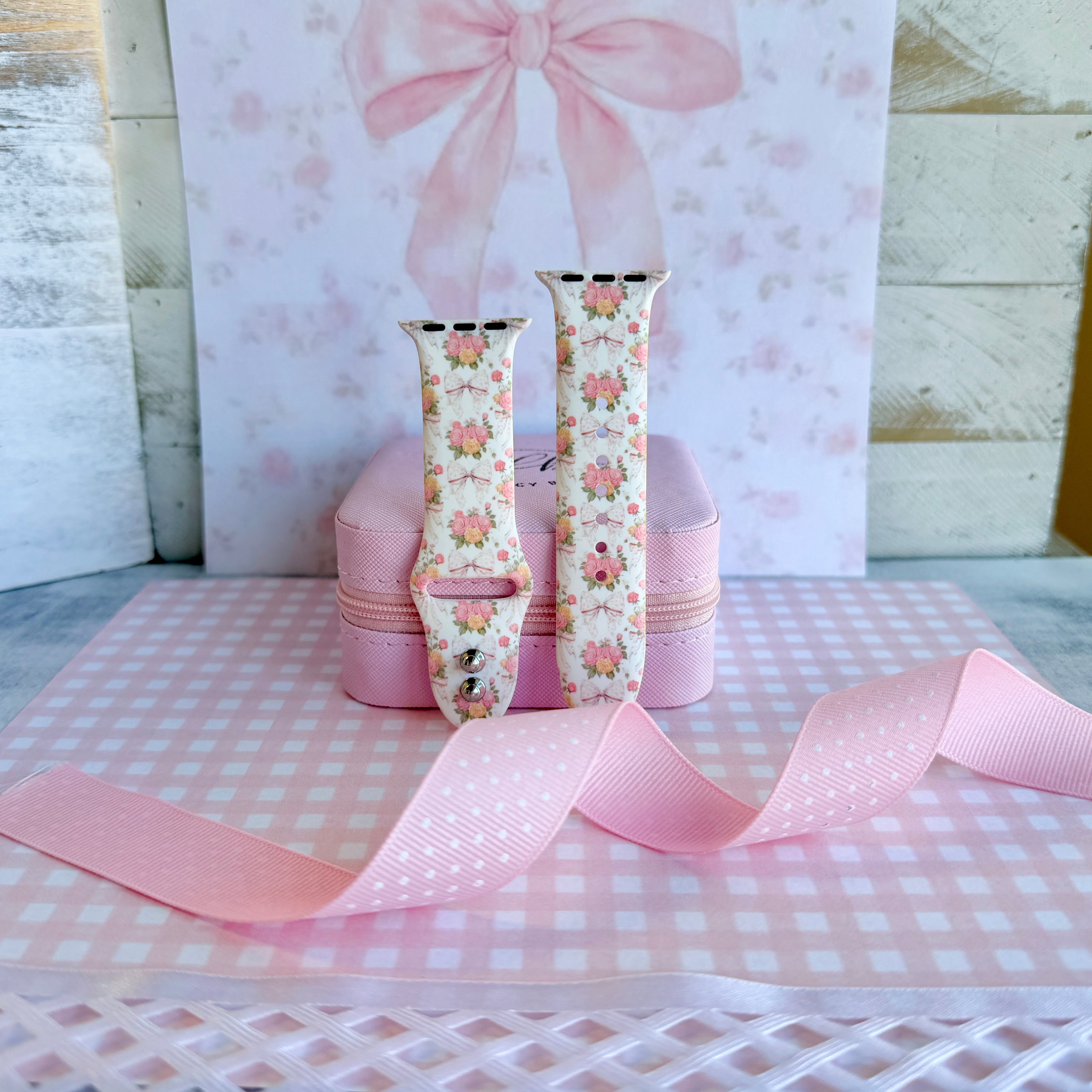 Ribbons & Roses Apple Watch band with pink roses and ribbon bows on cream background with pink rose and ribbon decorations