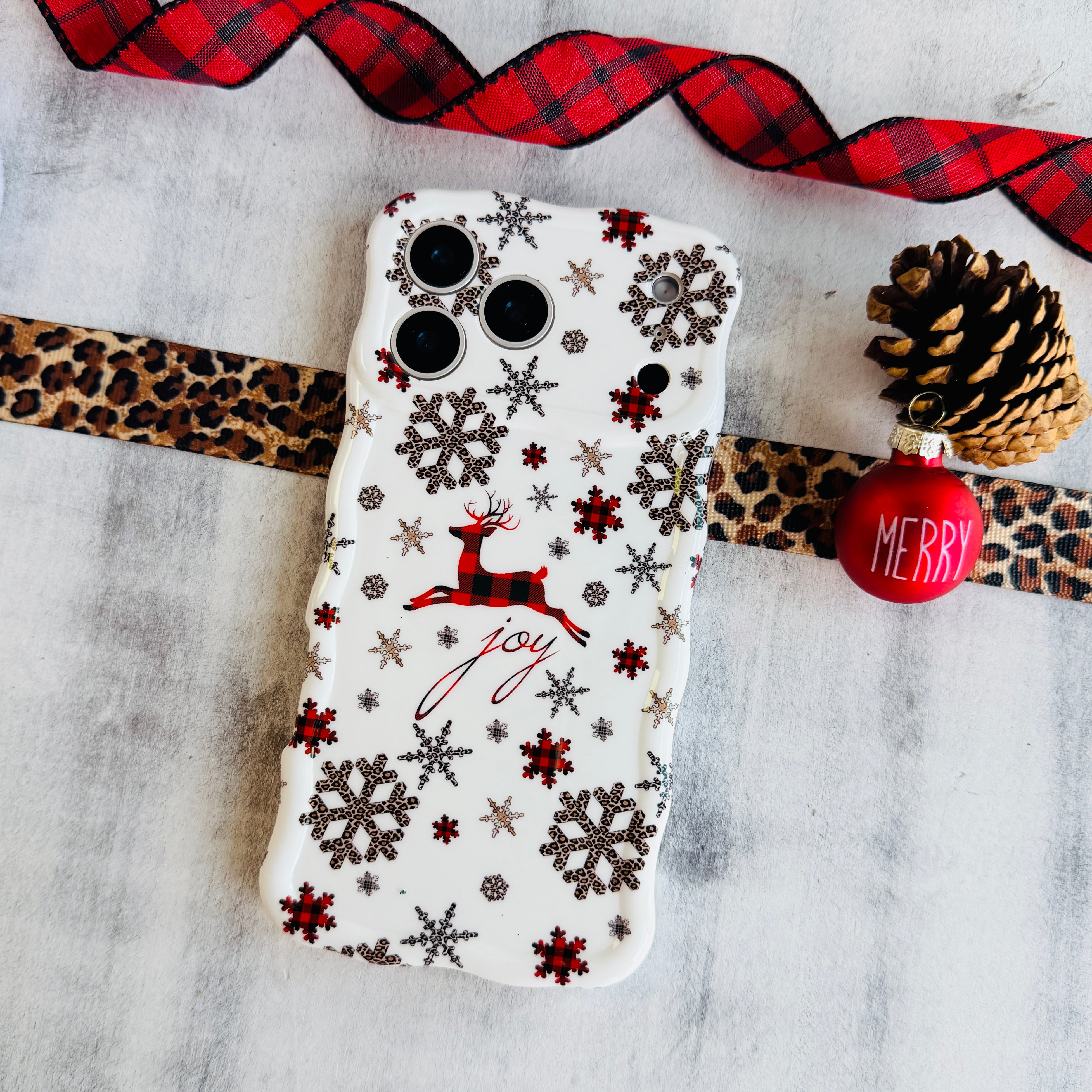 Slim holiday MagSafe iPhone case in white with snowflake pattern