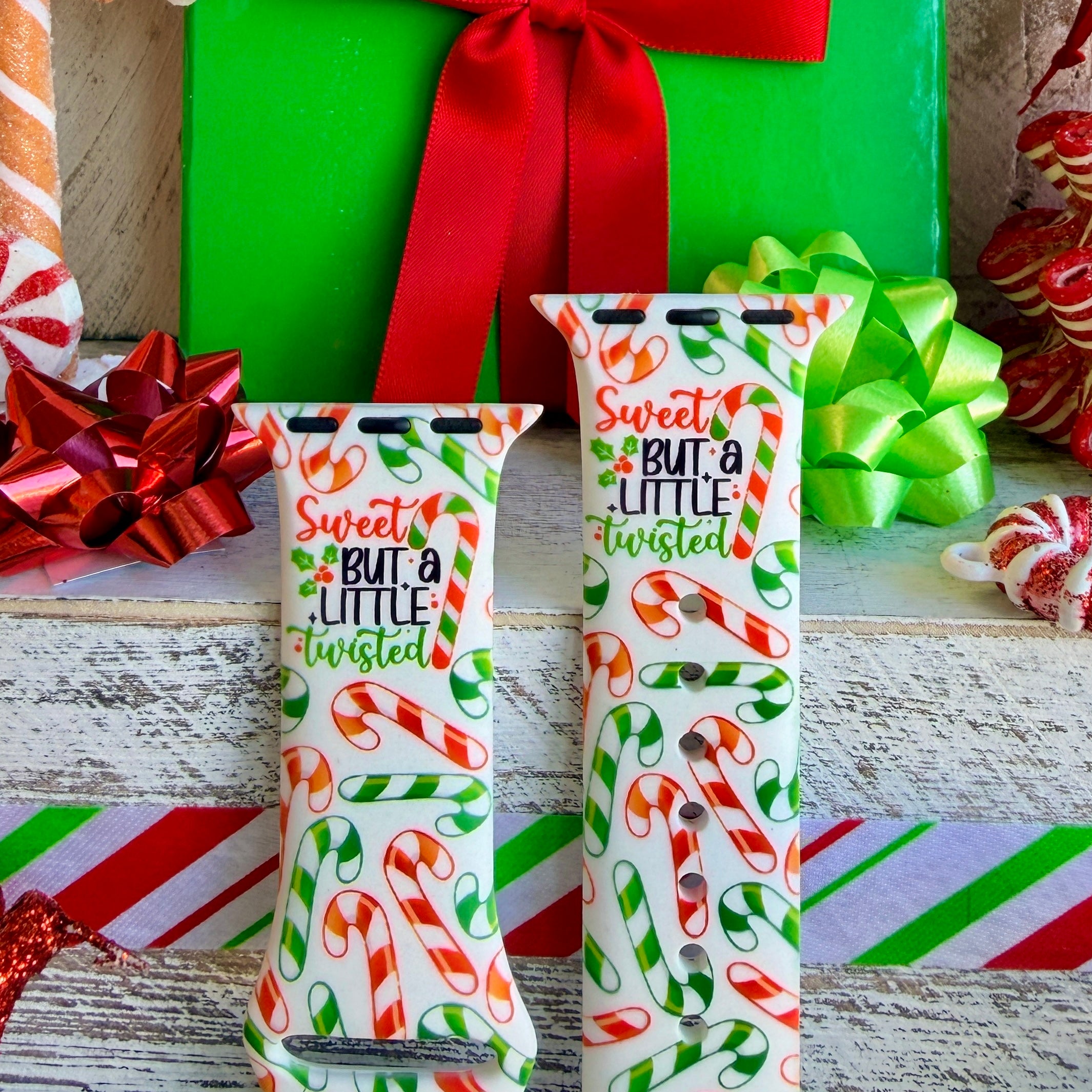 Close up of Twistmas Vibes silicone Apple Watch strap showing candy cane pattern