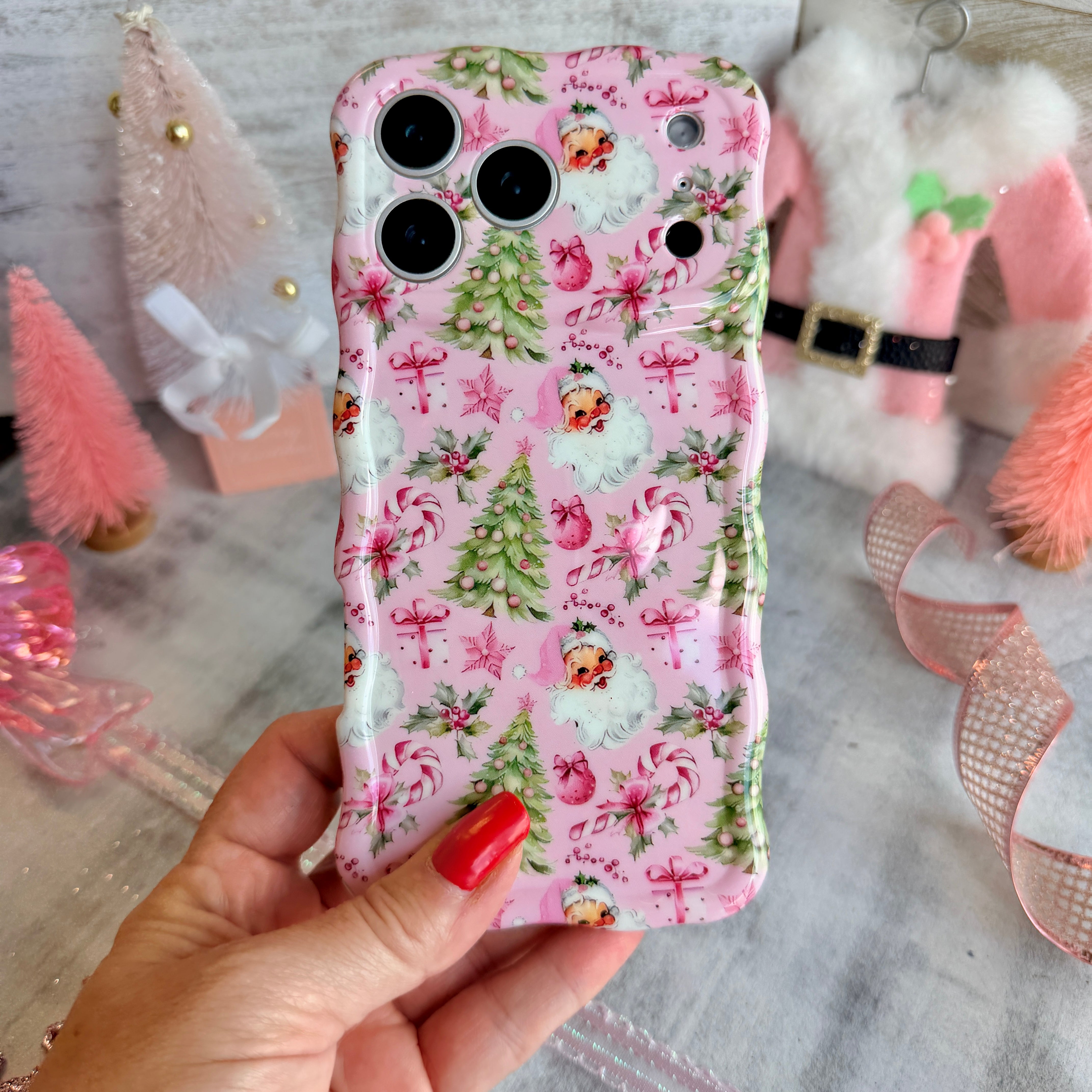 Jolly Pink Santa MagSafe iPhone case with pink Christmas trees, Santa, and ornaments by Fancy Bands