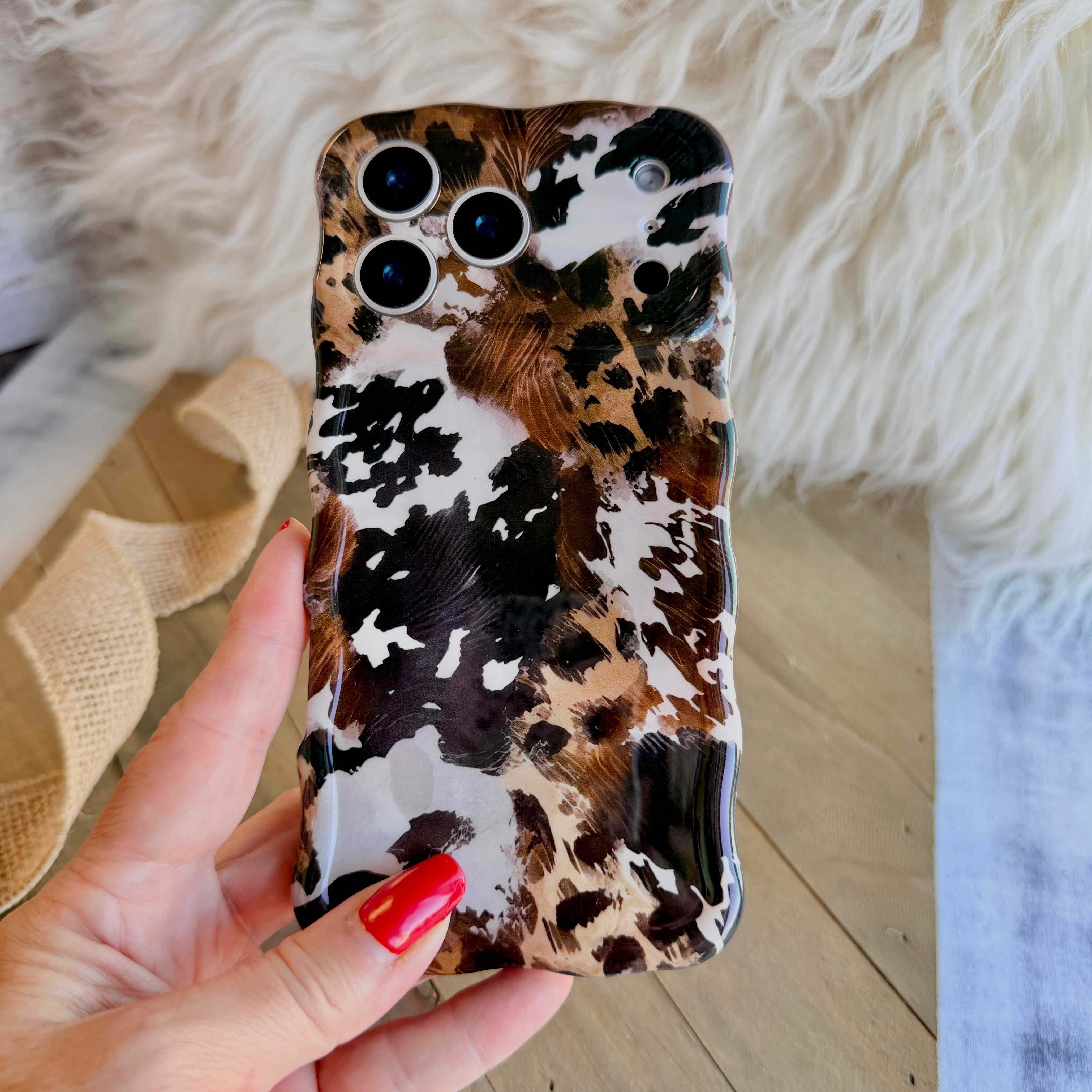 Rodeo Wild MagSafe iPhone case with cowhide and leopard print mix by Fancy Bands