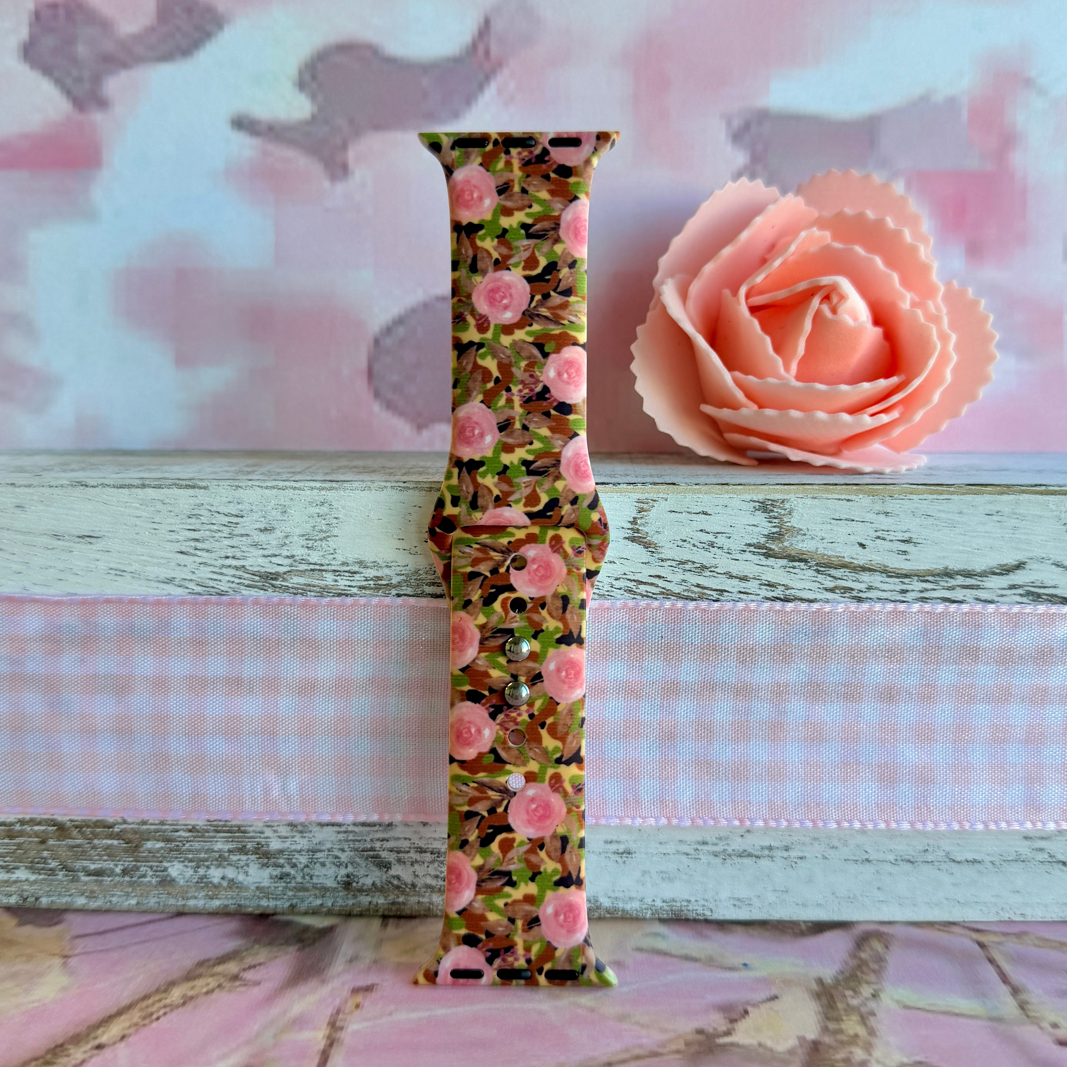 Sweet & Savage Apple Watch band with pink watercolor roses over camo print pattern with peach rose decoration