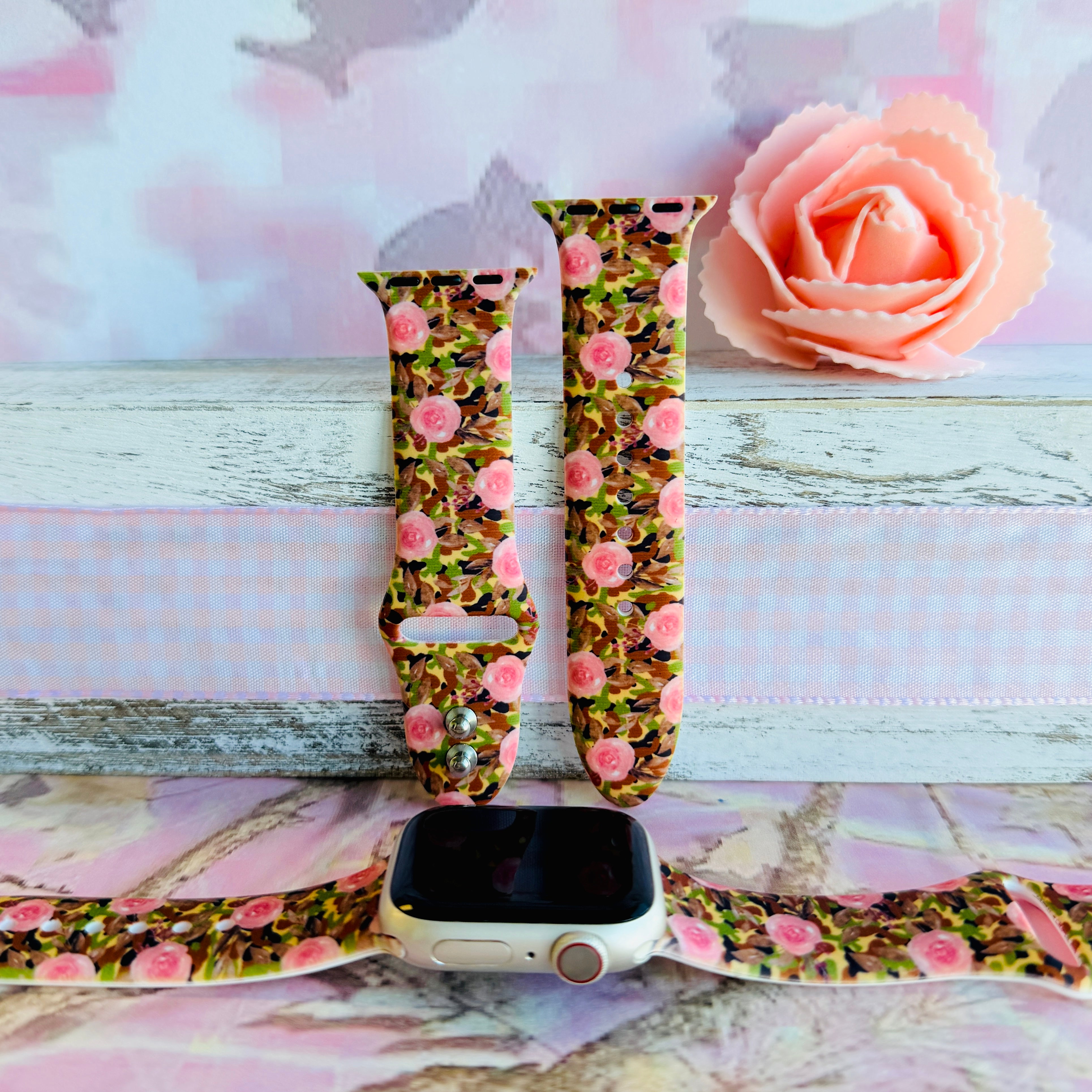 Sweet & Savage Apple Watch band with pink watercolor roses over camo print pattern with peach rose decoration