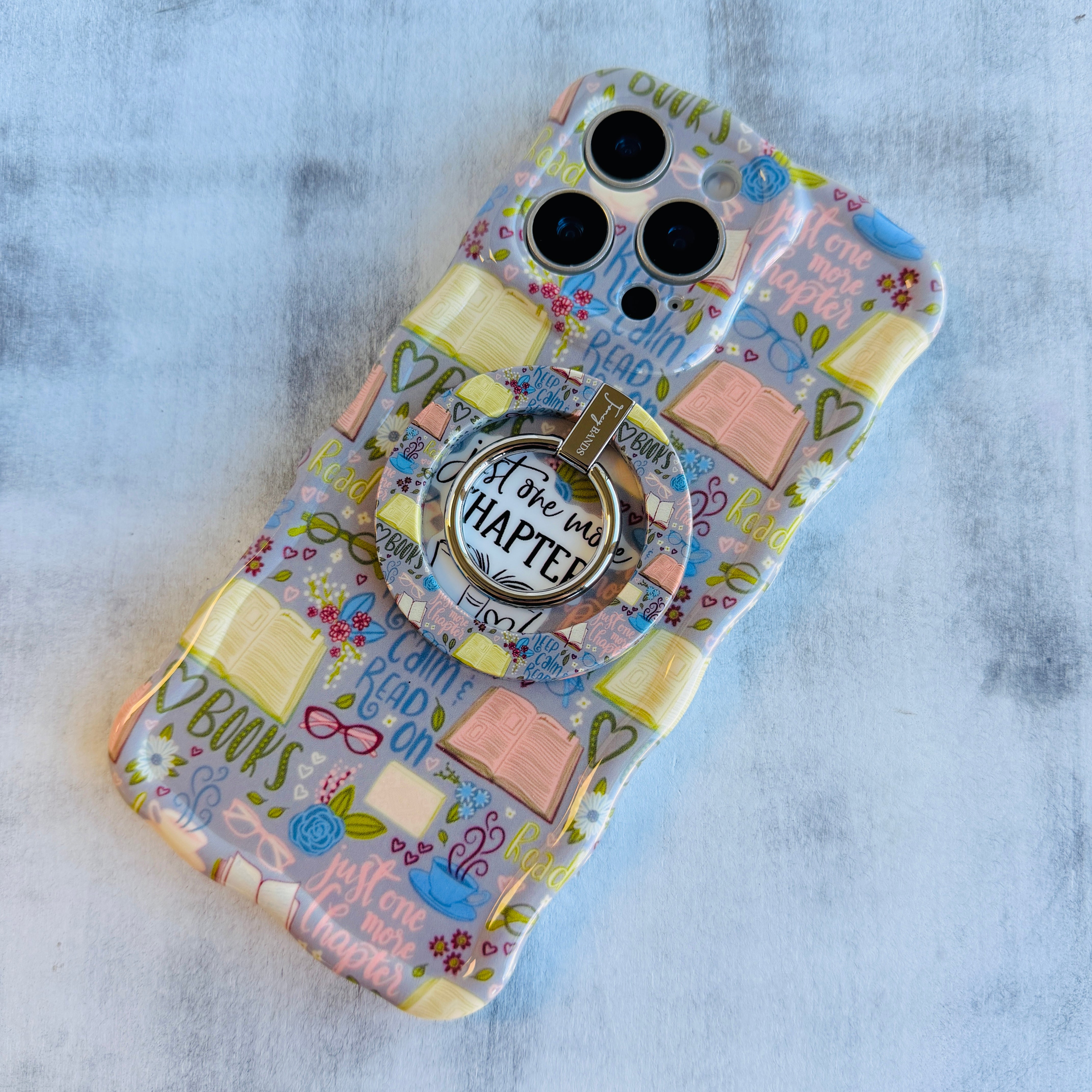 Book lover themed MagSafe phone grip ring with books coffee and glasses pattern compatible with iPhone and Samsung