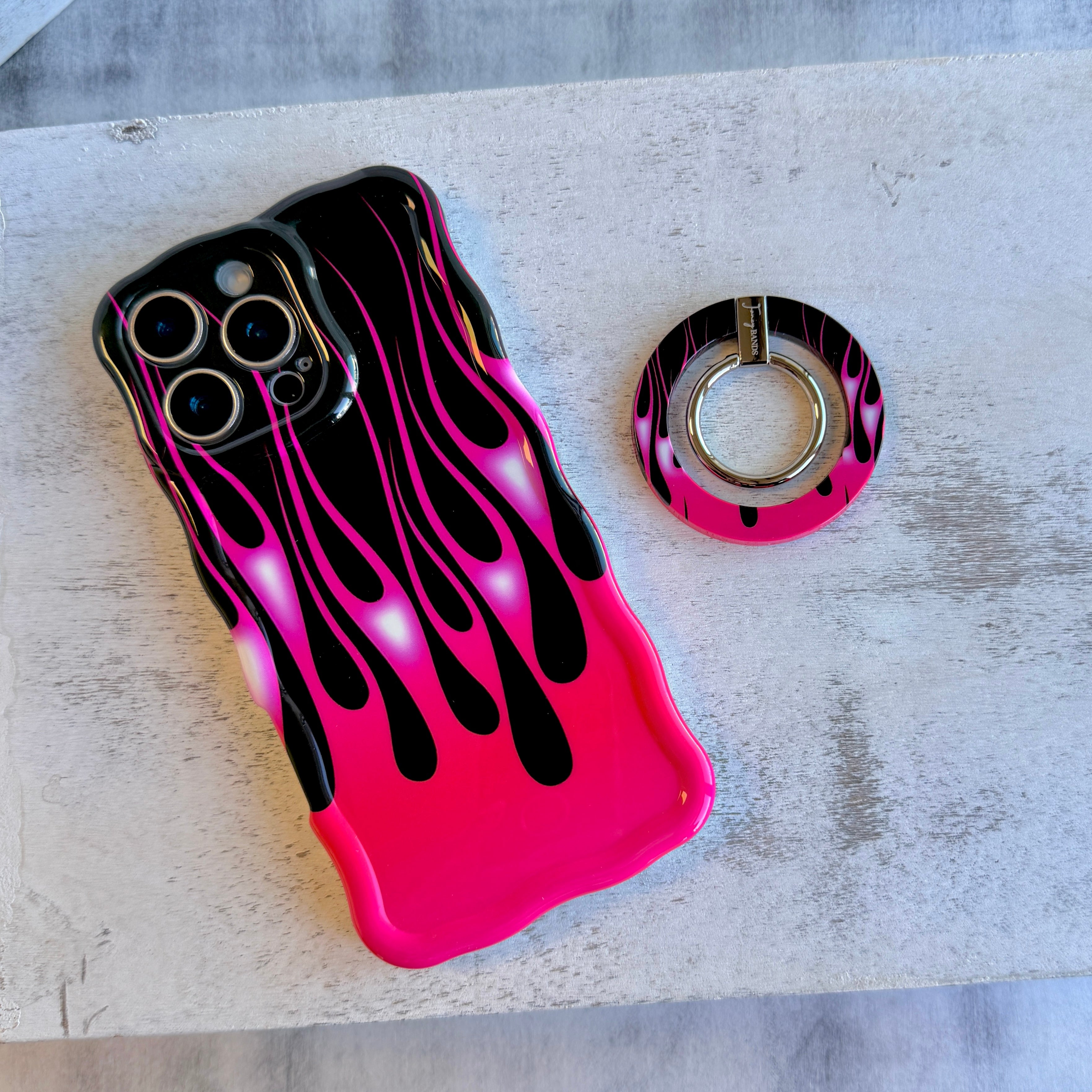Hot Rod Pink Flame pattern MagSafe phone grip ring with neon pink fire on black background compatible with iPhone and Samsung