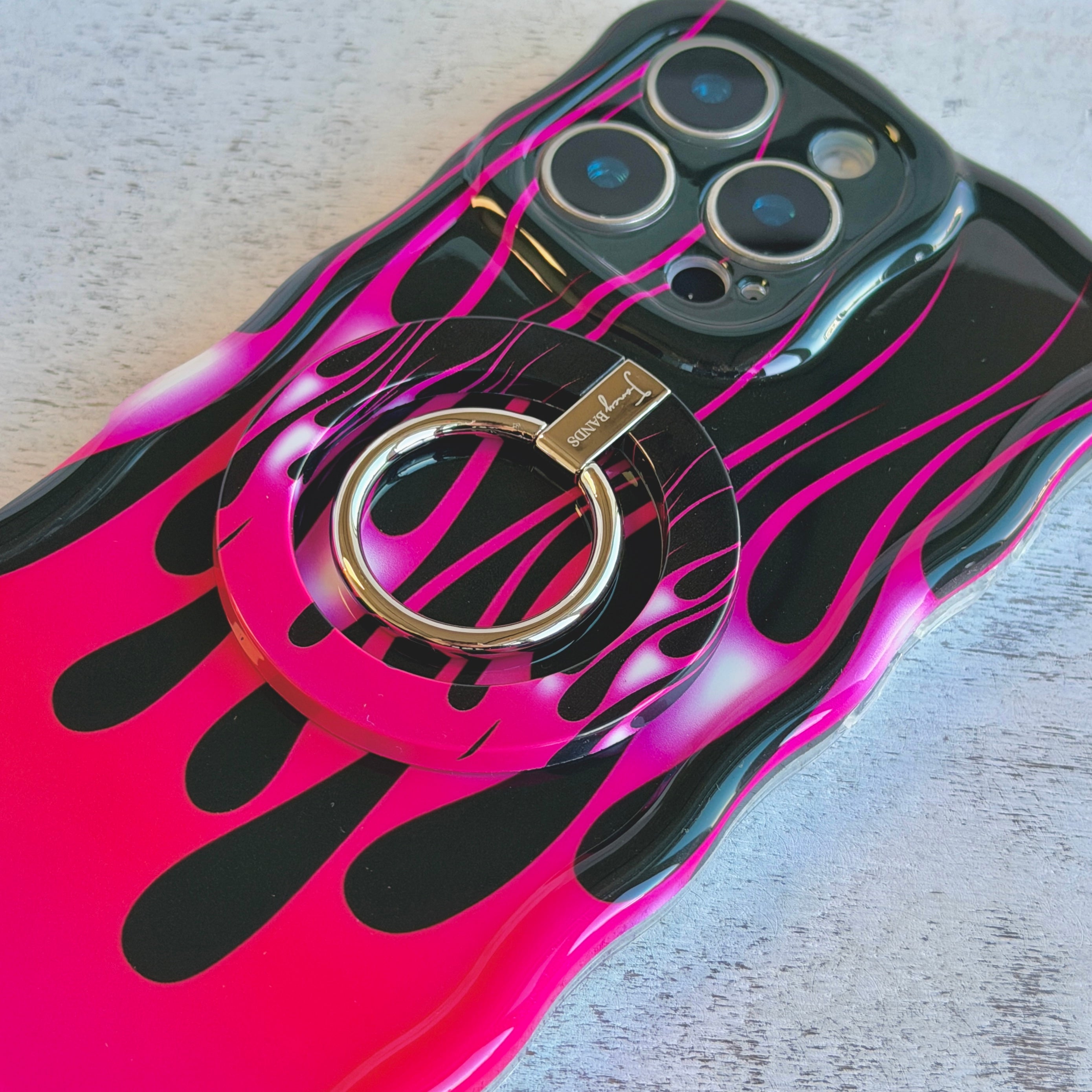 Hot Rod Pink Flame pattern MagSafe phone grip ring with neon pink fire on black background compatible with iPhone and Samsung