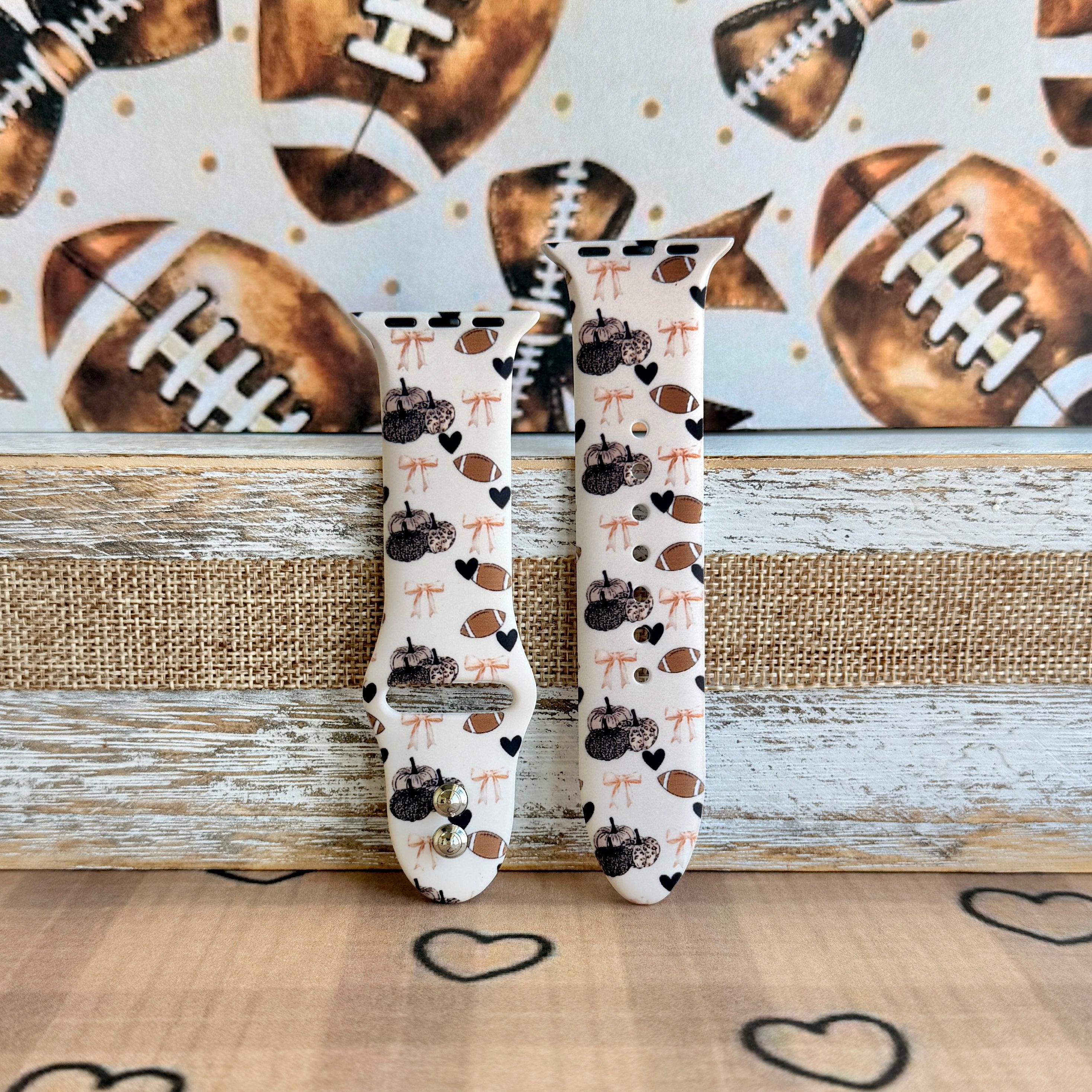 Game Day Darling coquette football print silicone band for Apple Watch with footballs, pumpkins, bows and hearts from Fancy Bands
