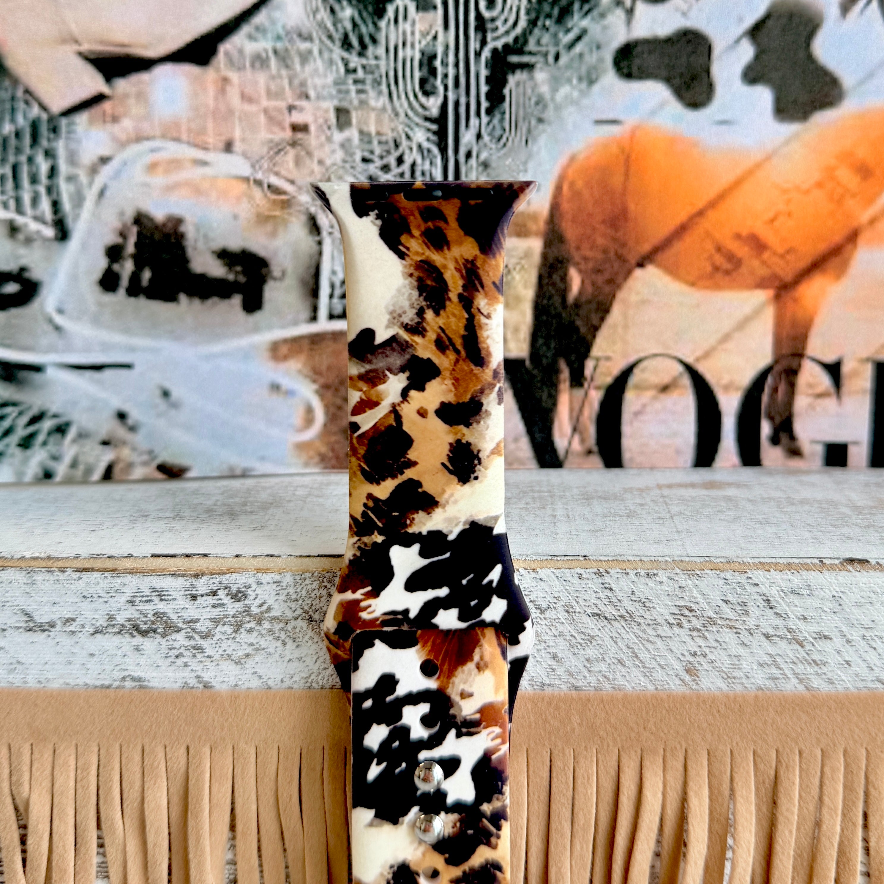Rodeo Wild Apple Watch band with cowhide and leopard print patterns in brown, black, and cream with Western decor