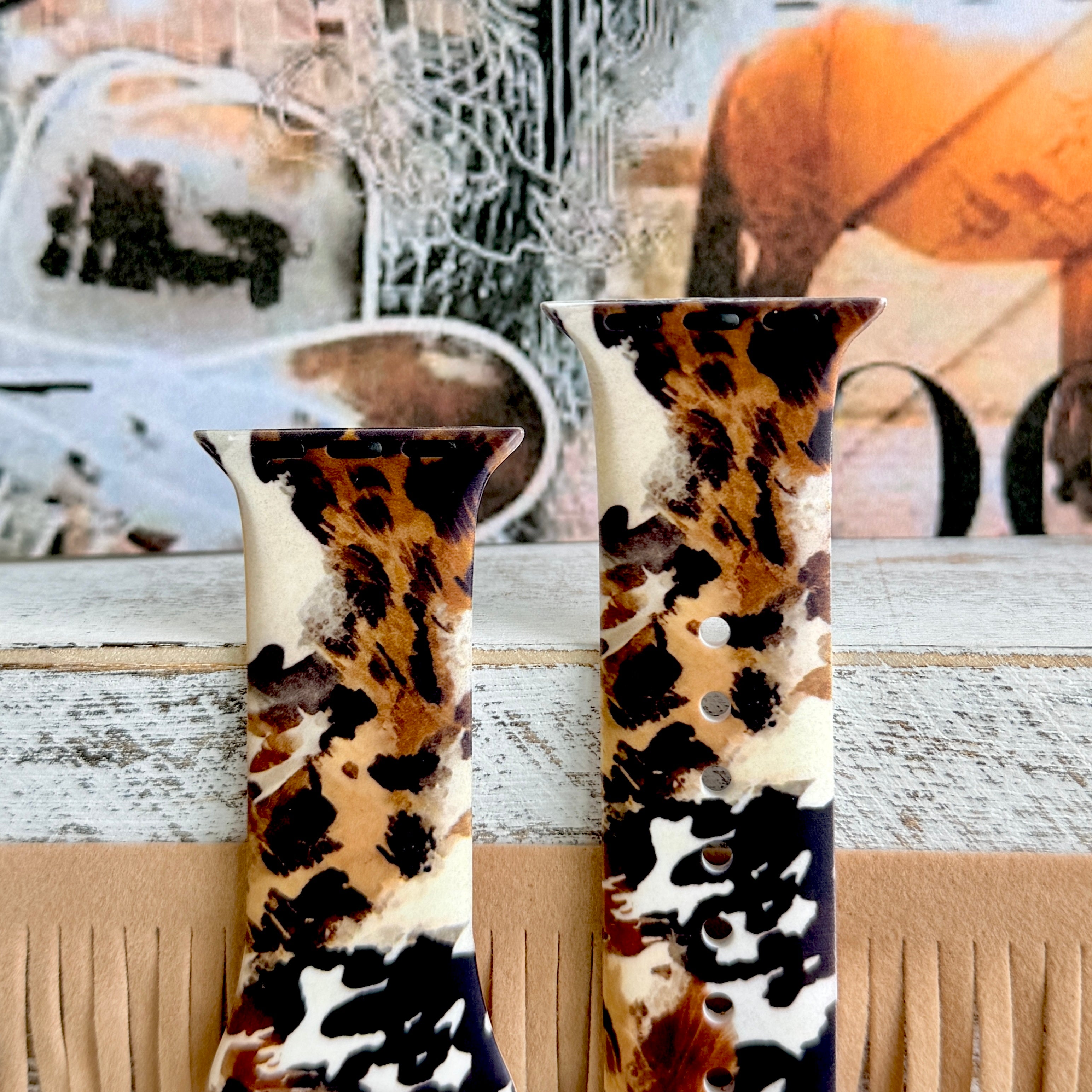 Rodeo Wild Apple Watch band with cowhide and leopard print patterns in brown, black, and cream with Western decor