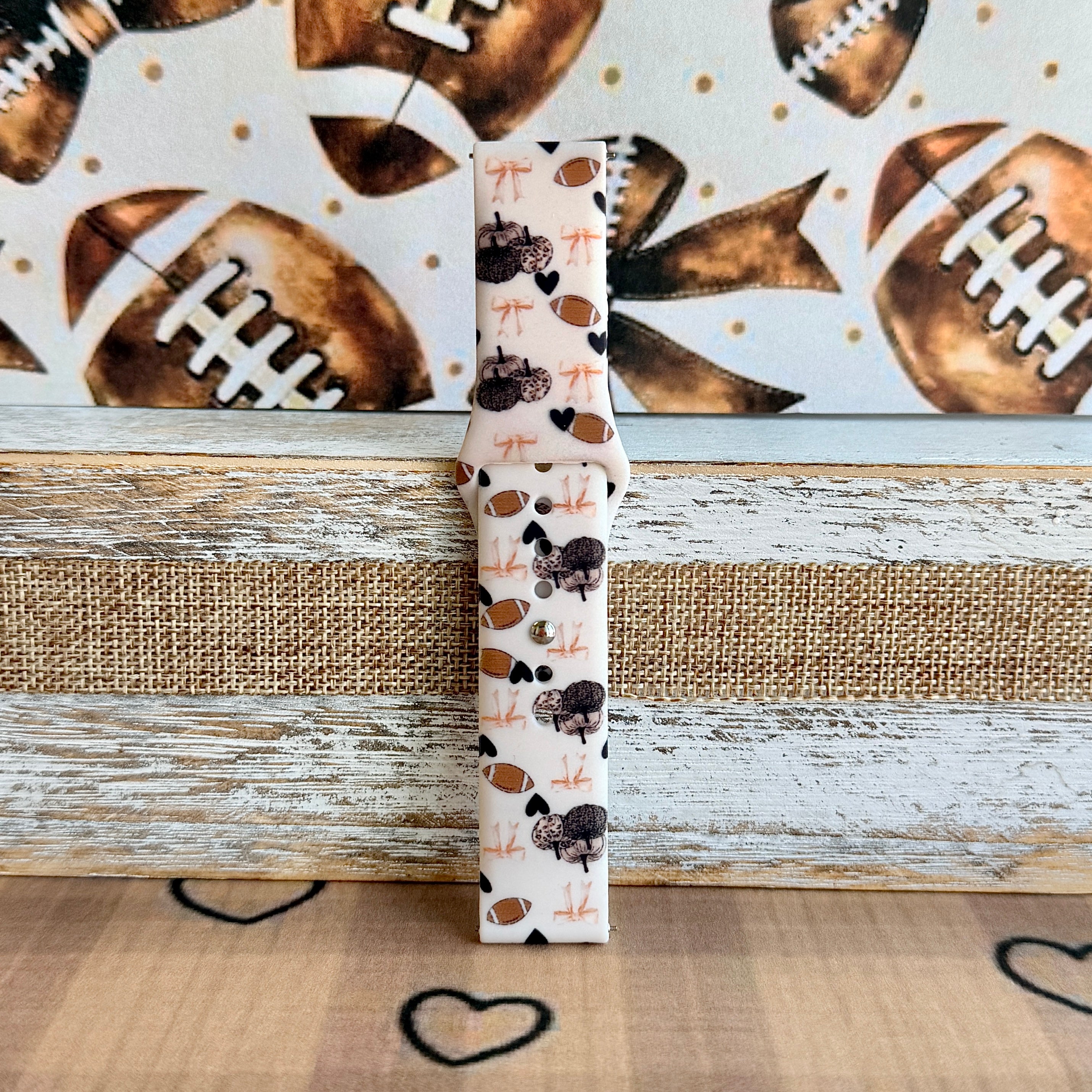 Game Day Darling coquette football print silicone band for Samsung Galaxy Watch with footballs, pumpkins, bows and hearts from Fancy Bands