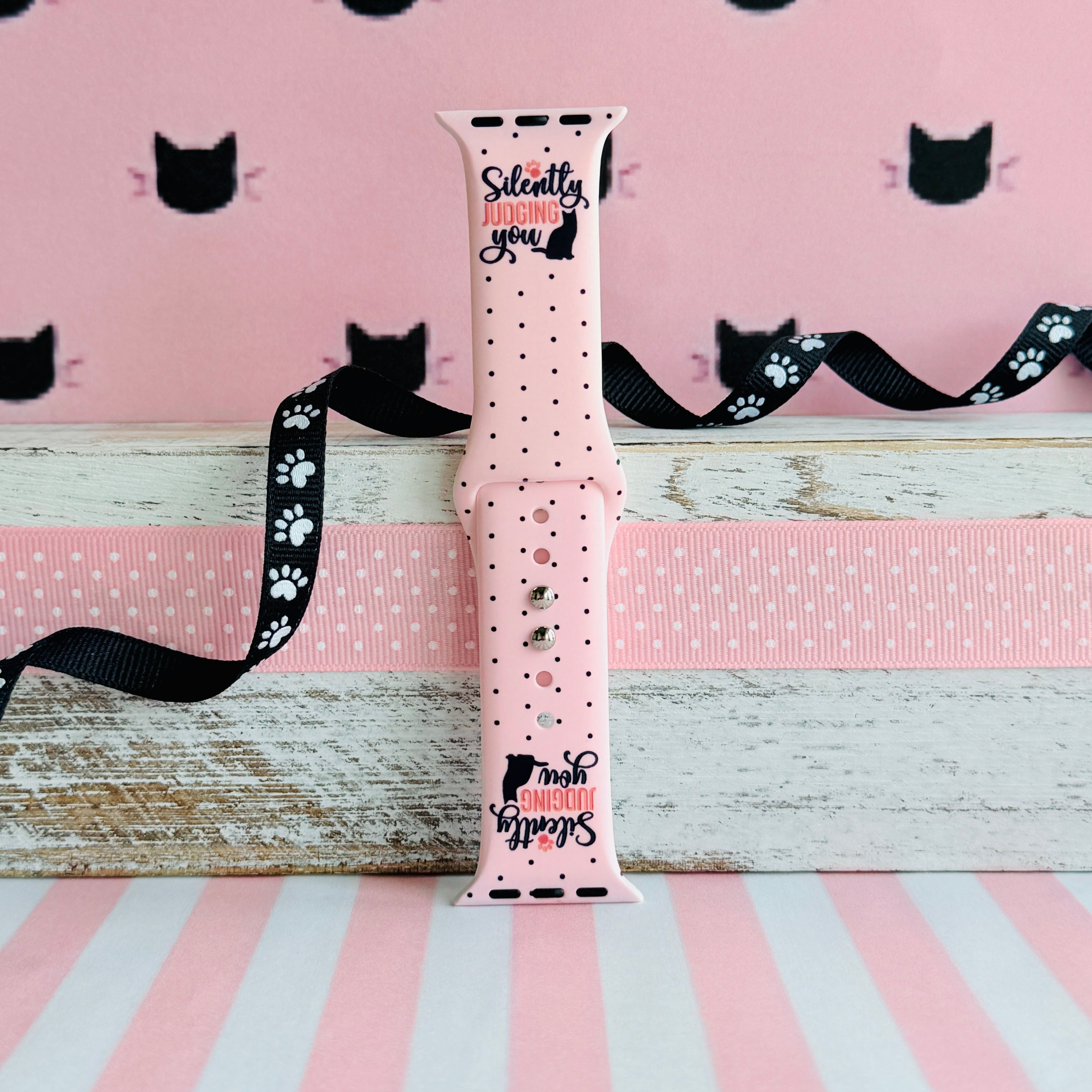 Silently Judging You Apple Watch band with black cat silhouette and funny text on pink background with polka dots