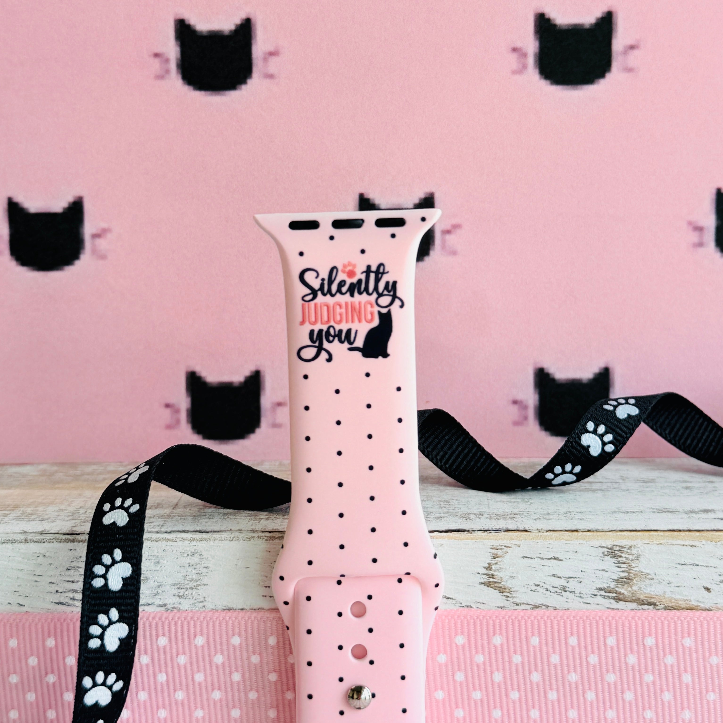 Silently Judging You Apple Watch band with black cat silhouette and funny text on pink background with polka dots
