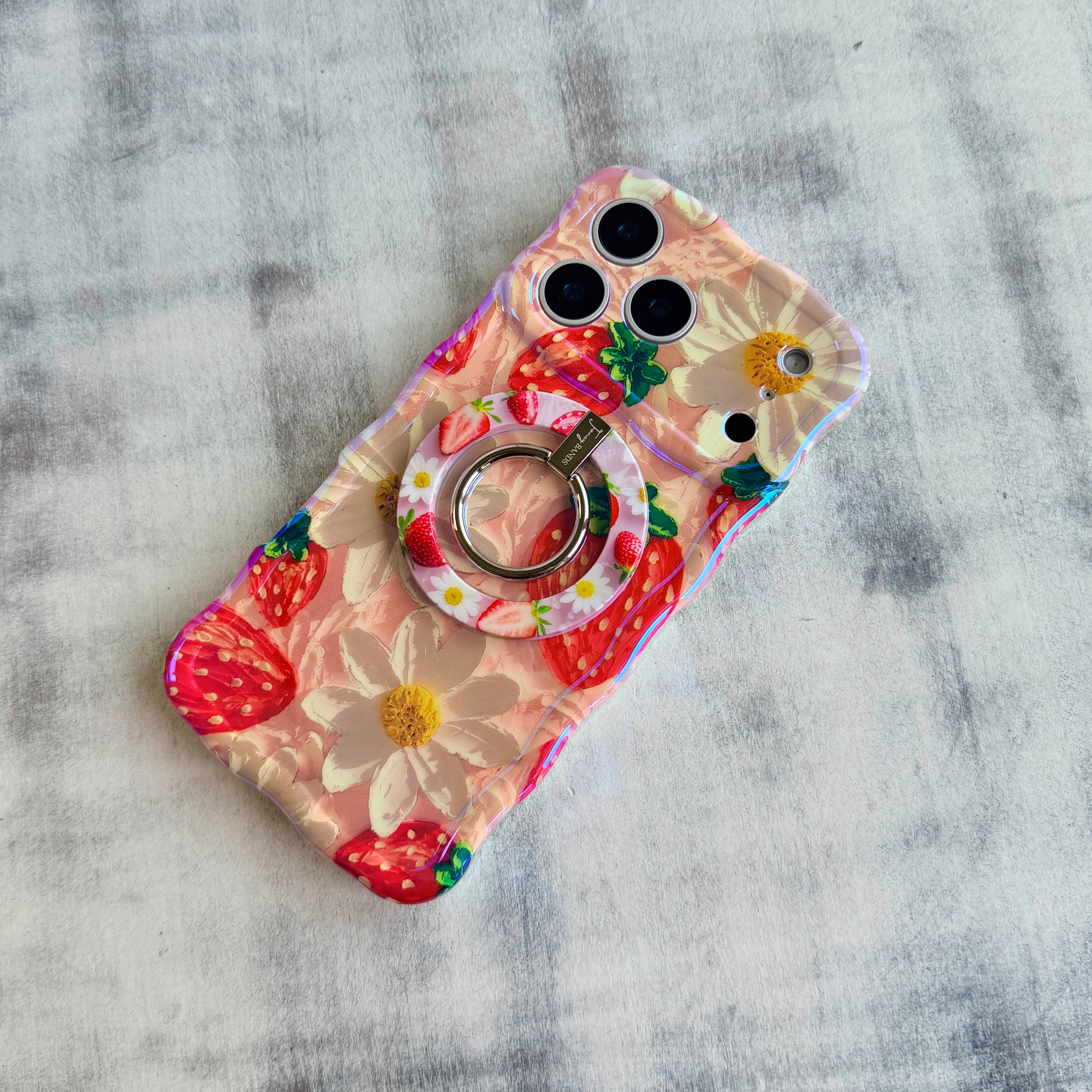 Berry Cute Blooms strawberry and daisy pattern MagSafe phone grip ring on pink background compatible with iPhone and Samsung