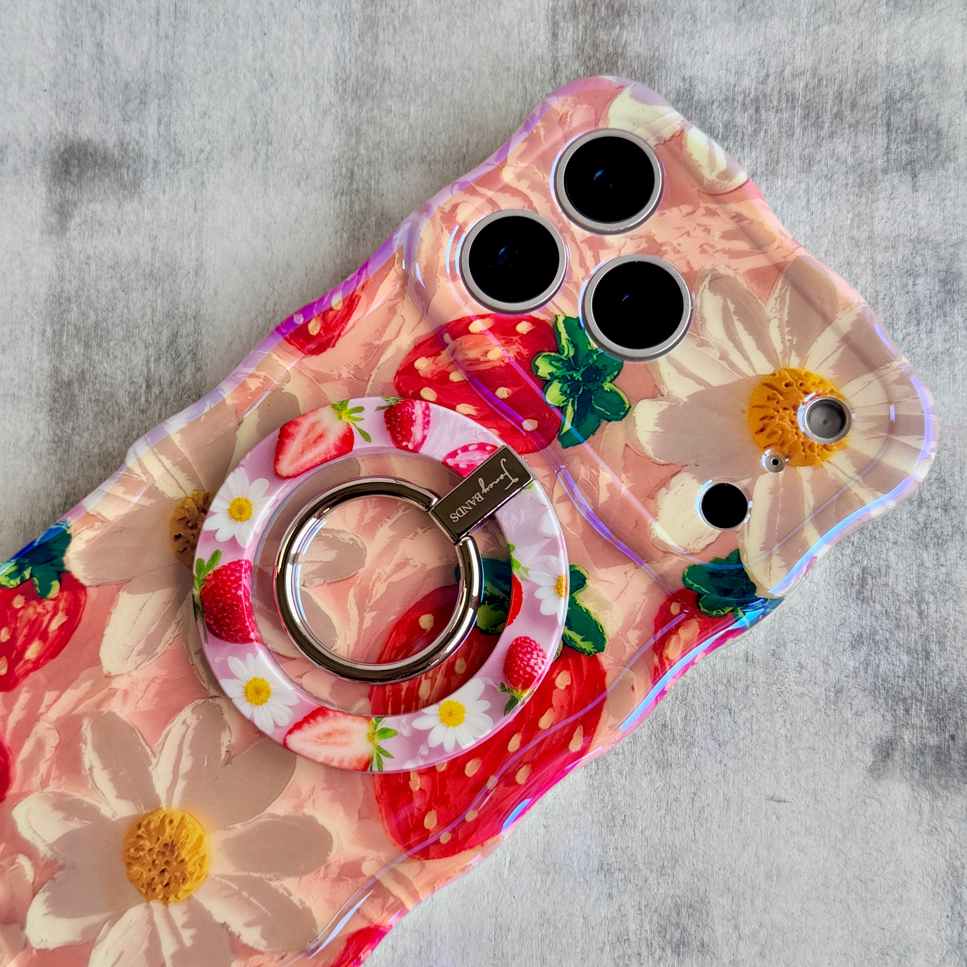 Berry Cute Blooms strawberry and daisy pattern MagSafe phone grip ring on pink background compatible with iPhone and Samsung