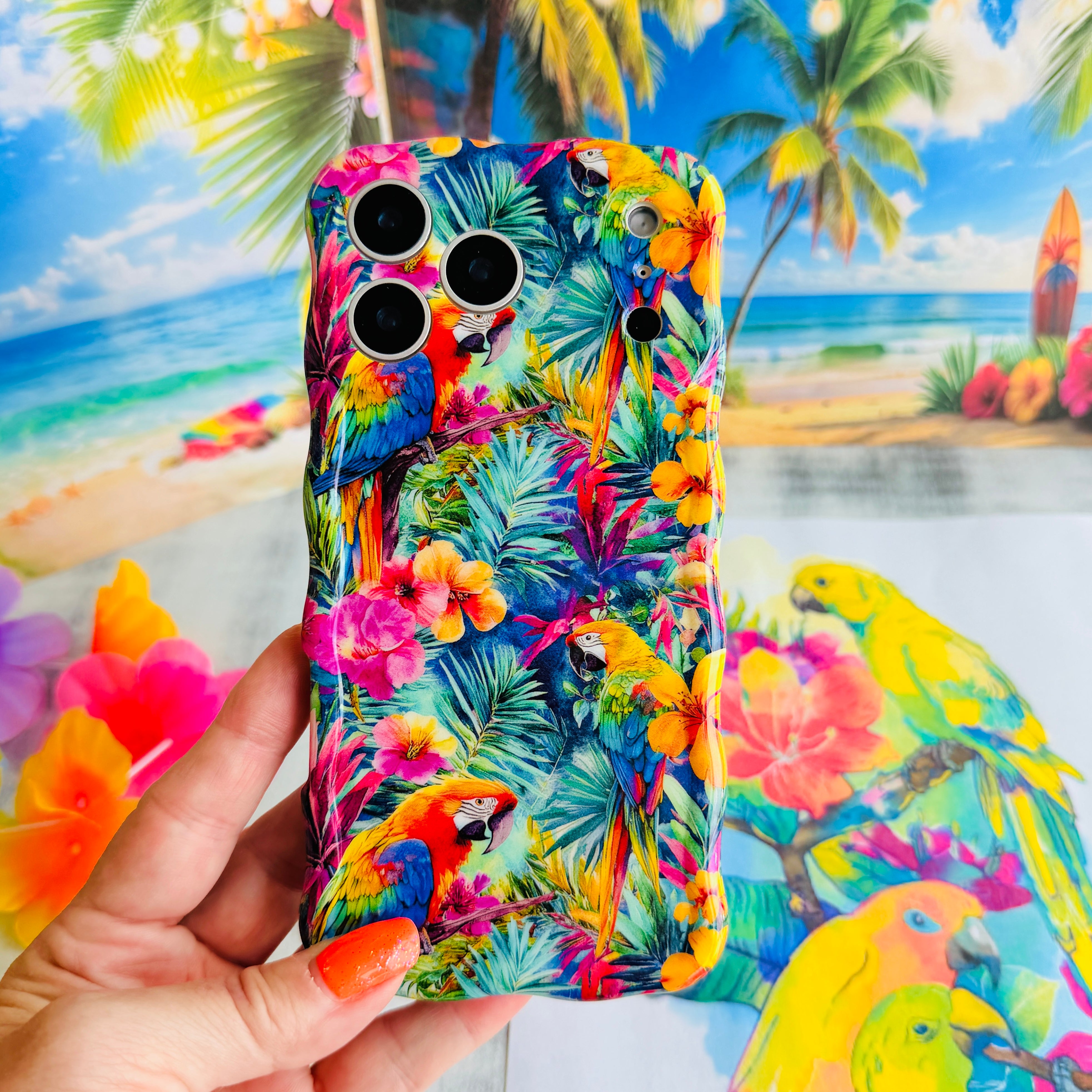 Trendy wavy iPhone case featuring a vibrant tropical pattern of red macaws, pink hibiscus, and green palm leaves with a high-gloss finish.