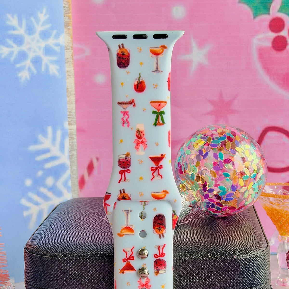 Close-up of a single Holiday Spirits, Please? Apple Watch band strap, Christmas cocktail print on powder blue