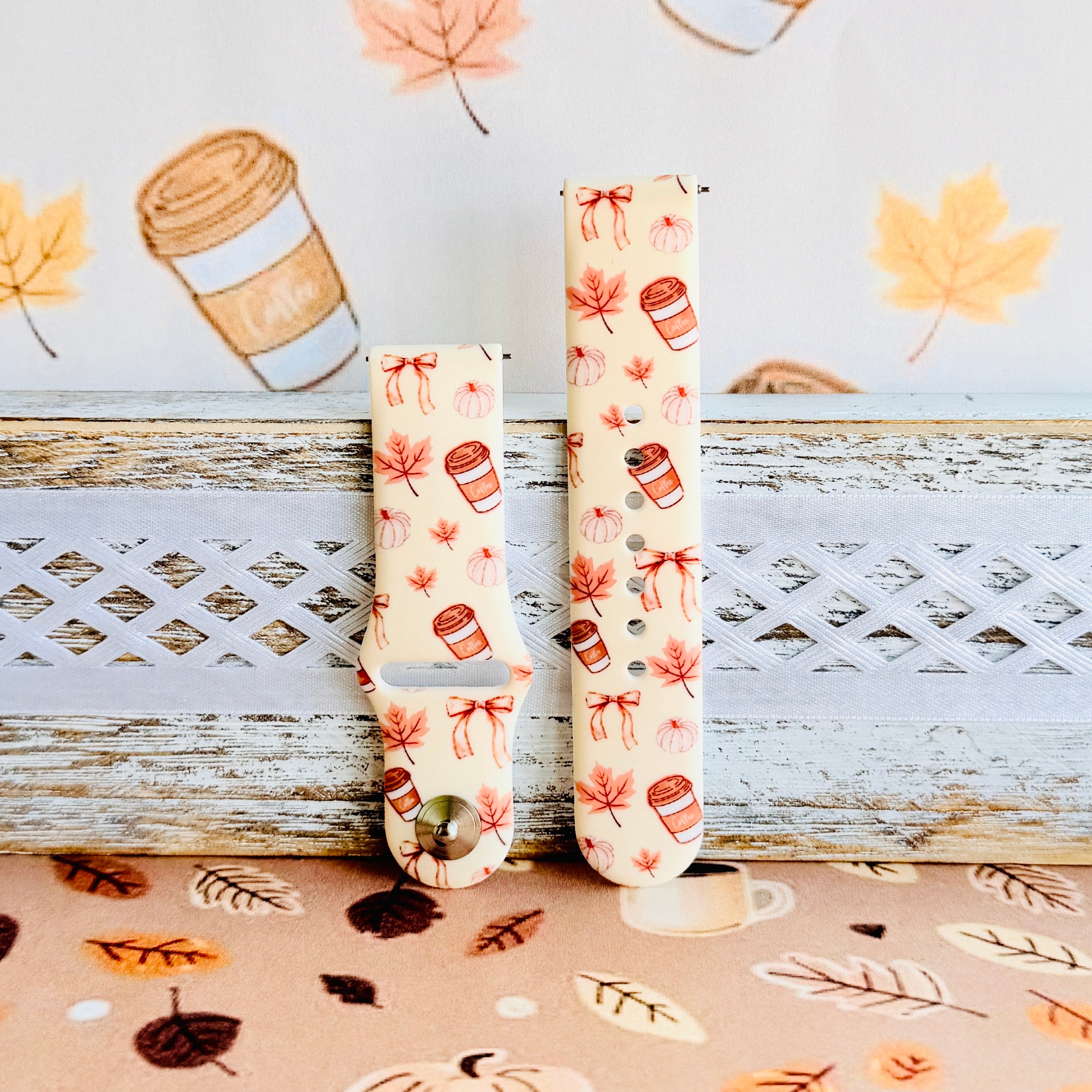 Falling in Love a Latte Samsung Galaxy Watch band shown in both size options on a white bench, cream coffee and pumpkin print.