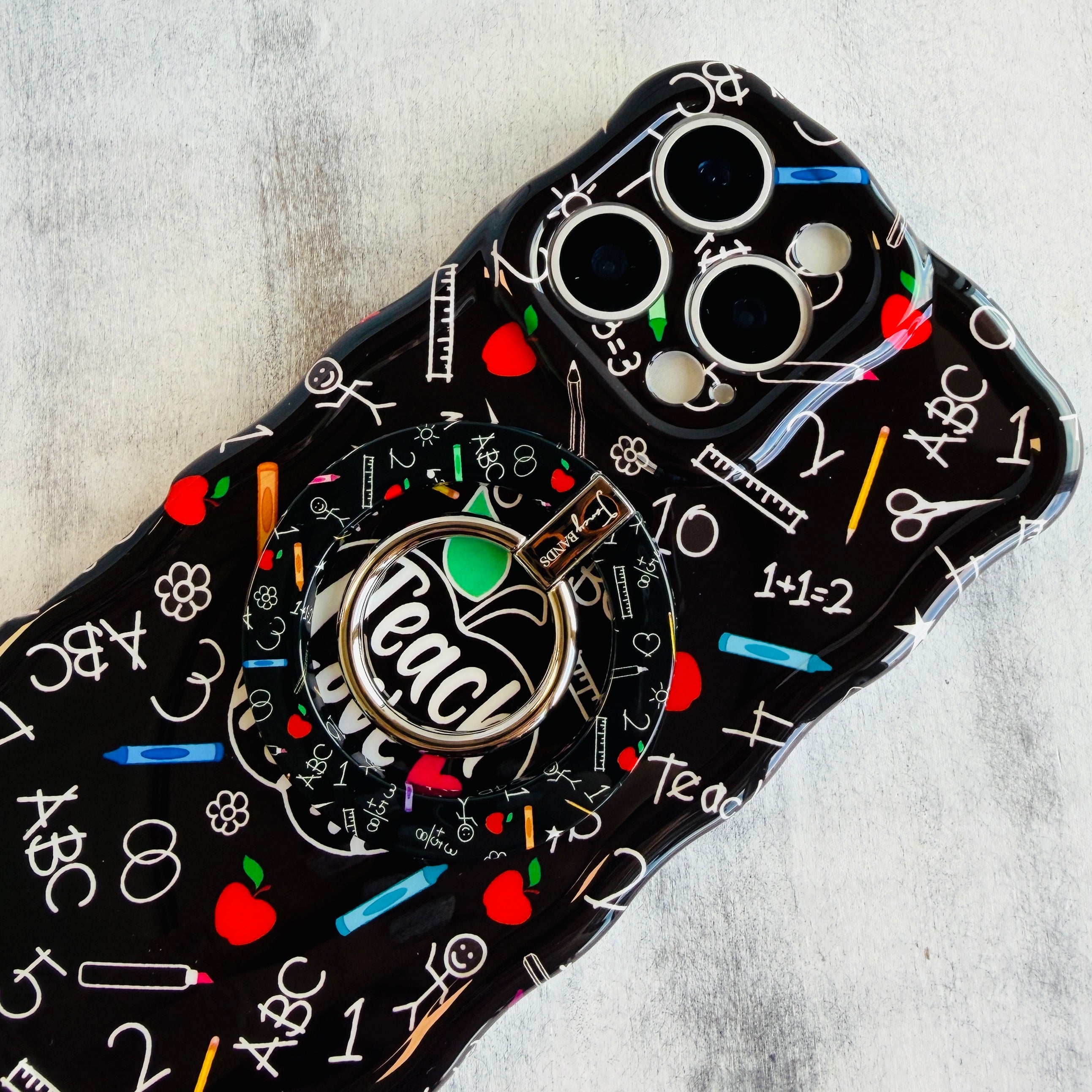 Teach Love Inspire school chalkboard pattern MagSafe phone grip ring with apples rulers and pencils compatible with iPhone and Samsung