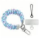 Twinkle All The Way scrunchie phone wrist strap laid flat with silver clasp and phone tab, pastel Christmas lights on blue