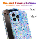 Twinkle All The Way iPhone case with 1 mm raised screen edges and 1.5 mm raised camera lens edges, glowing pastel Christmas bulbs