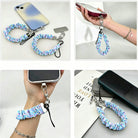 Four views of the Twinkle All The Way scrunchie phone wrist strap: with its phone tab, dangling from a phone in hand, worn on the wrist, and clipped to a pouch zipper