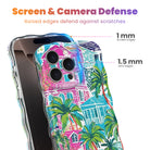 Trendy wavy iPhone case featuring a vibrant tropical resort scene with pink villas and green palm trees with a high-gloss finish.