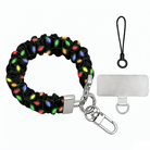 Christmas Lights scrunchie phone wrist strap laid flat, colorful bulbs on black, with silver clasp, lanyard loop and phone tab