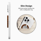 Slim design diagram for the Spotted Looking Cute MagSafe grip ring, showing the low-profile collapsible ring sliding easily into a pocket.