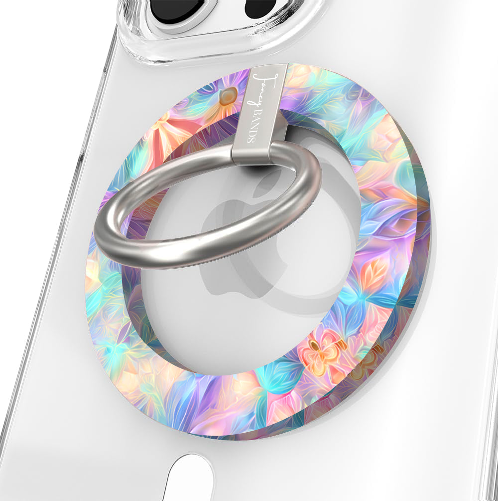 Pastel Paradise iridescent floral MagSafe phone grip ring with glowing lavender blue and coral petals compatible with iPhone and Samsung