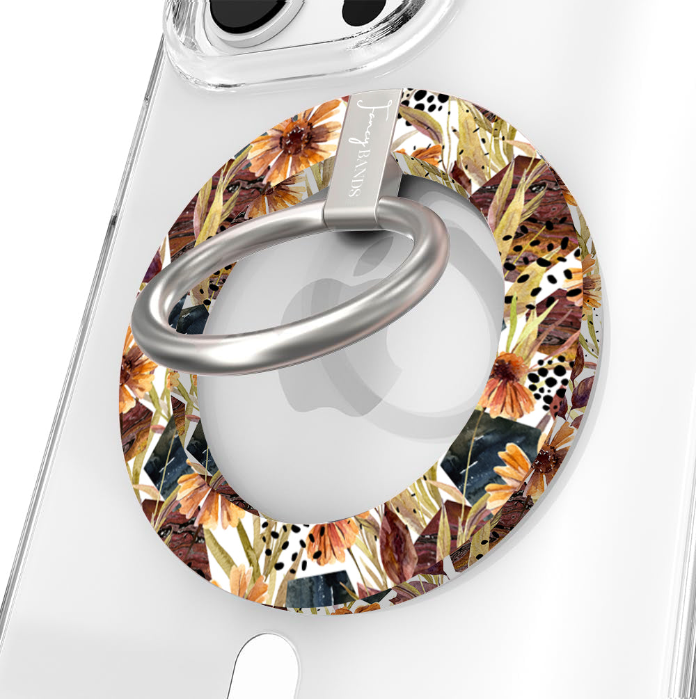 Sienna Petals Hold It Fancy MagSafe grip ring on a clear iPhone case, cream ring printed with watercolor rust and orange flowers and olive leaves.